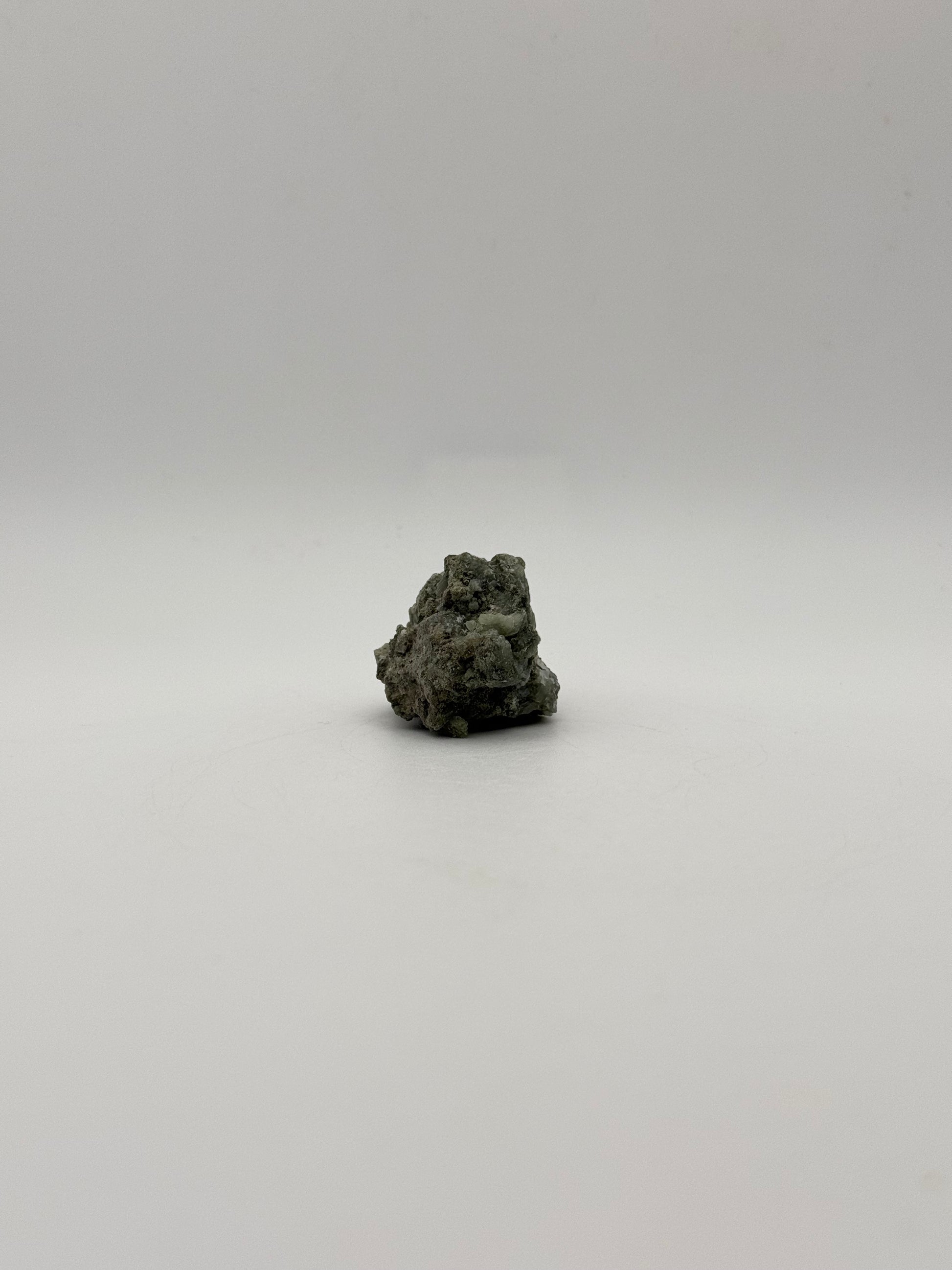 Raw prehnite specimen with amazing green color.