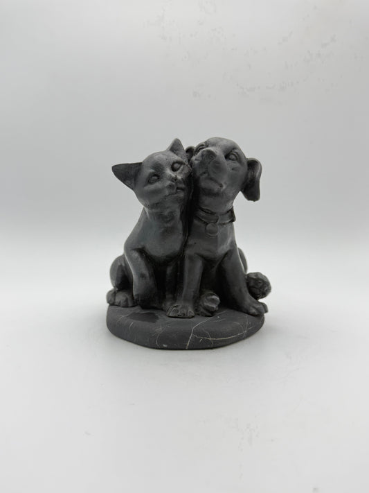 Shungite carving of a cat and dog.