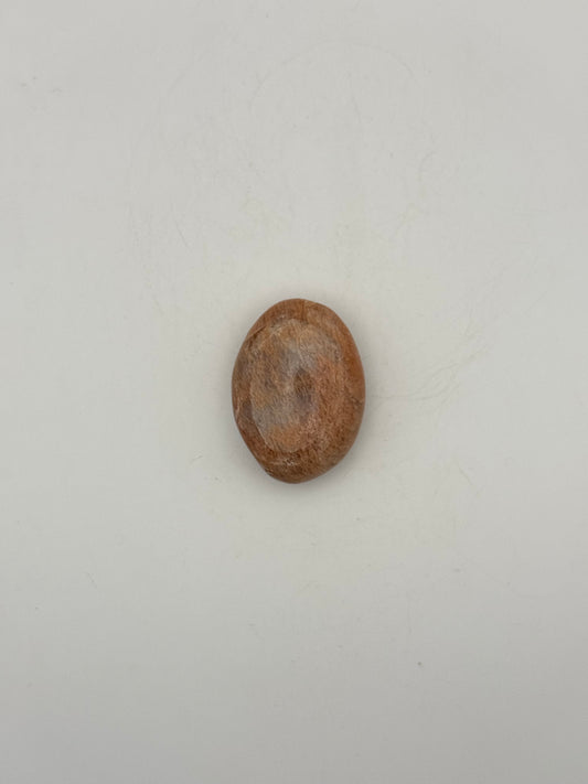 Polished Peach moonstone palm stone.
