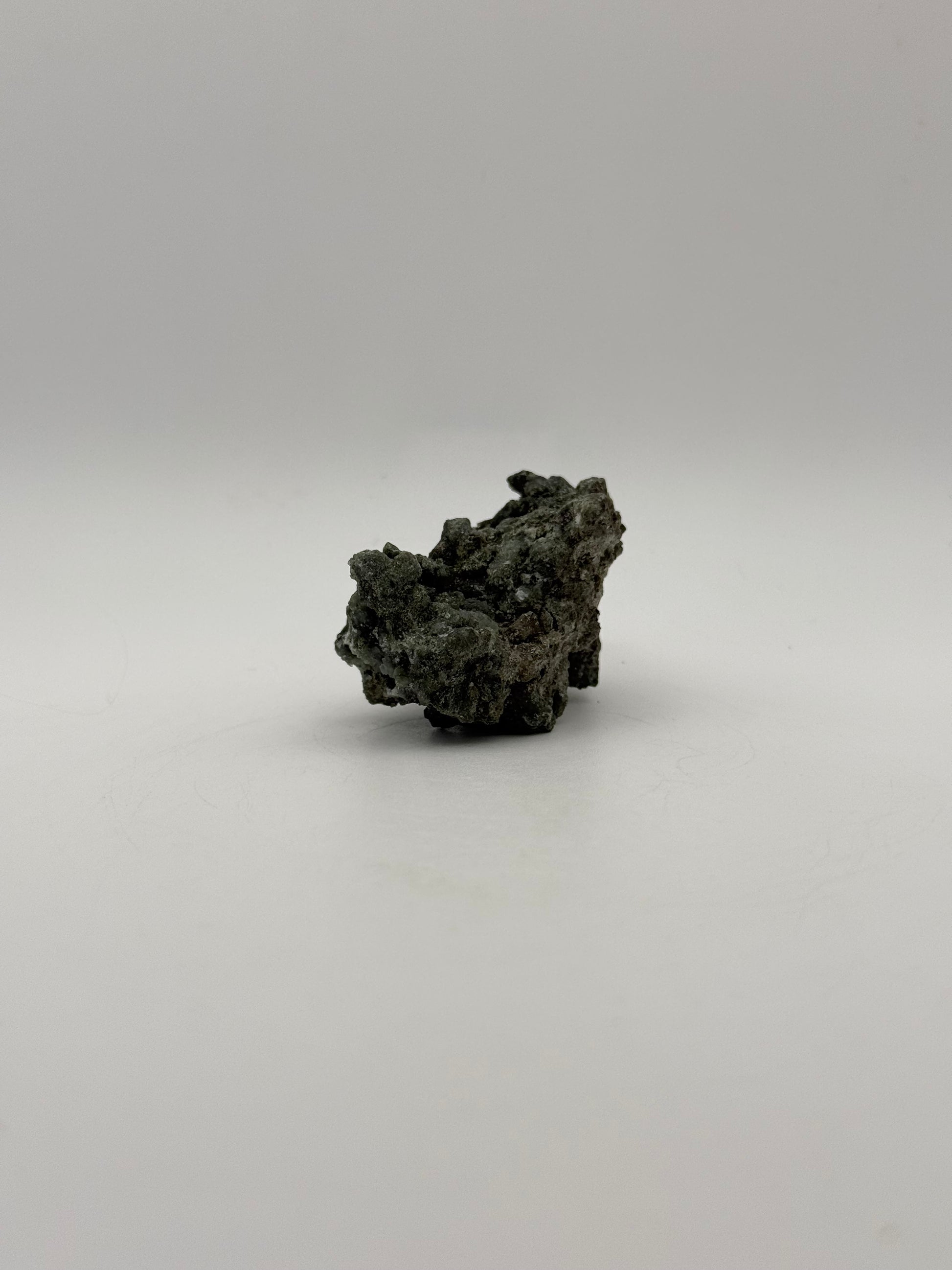 Raw prehnite specimen with amazing green color.