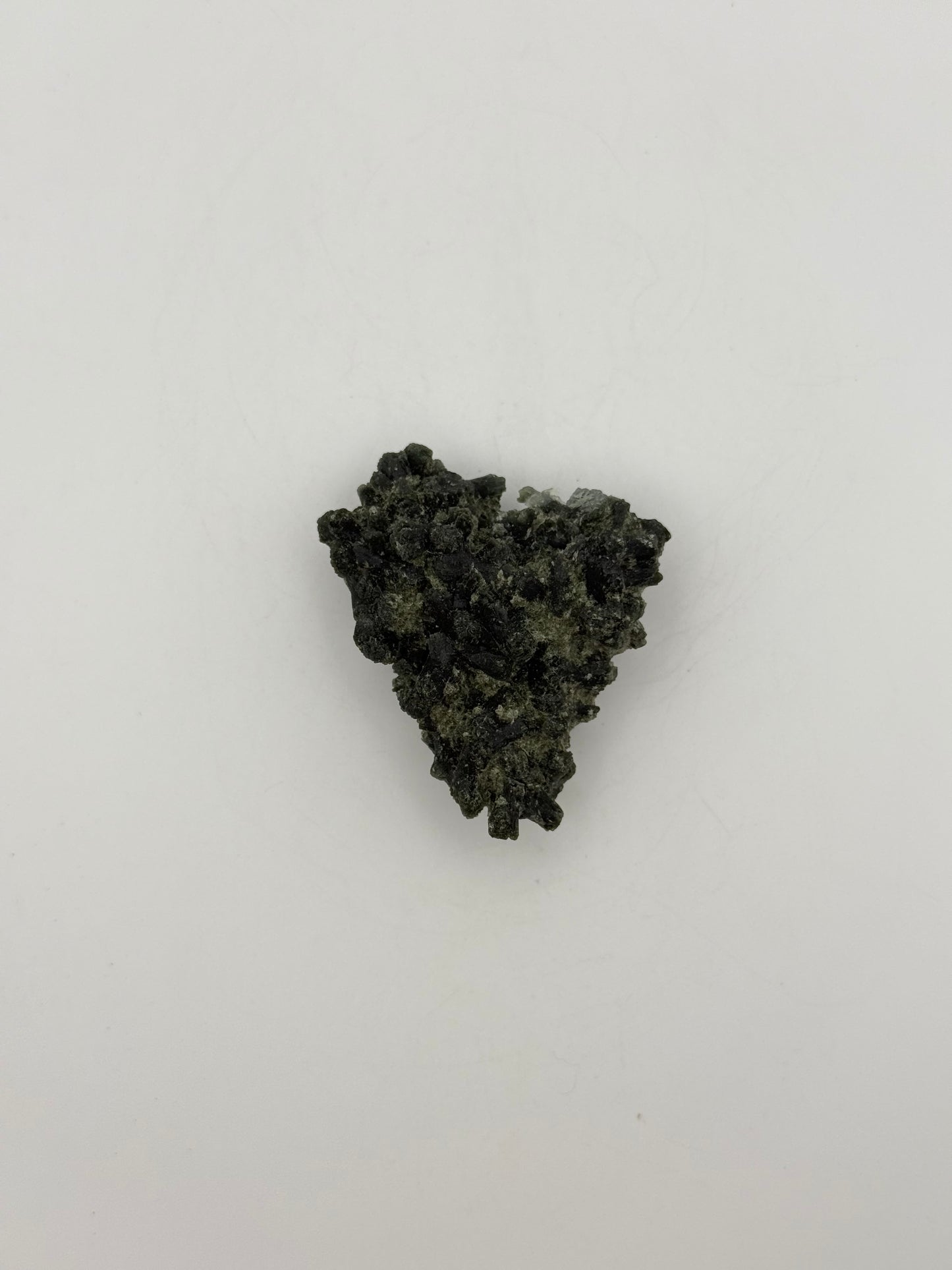 Raw prehnite specimen with amazing green color.