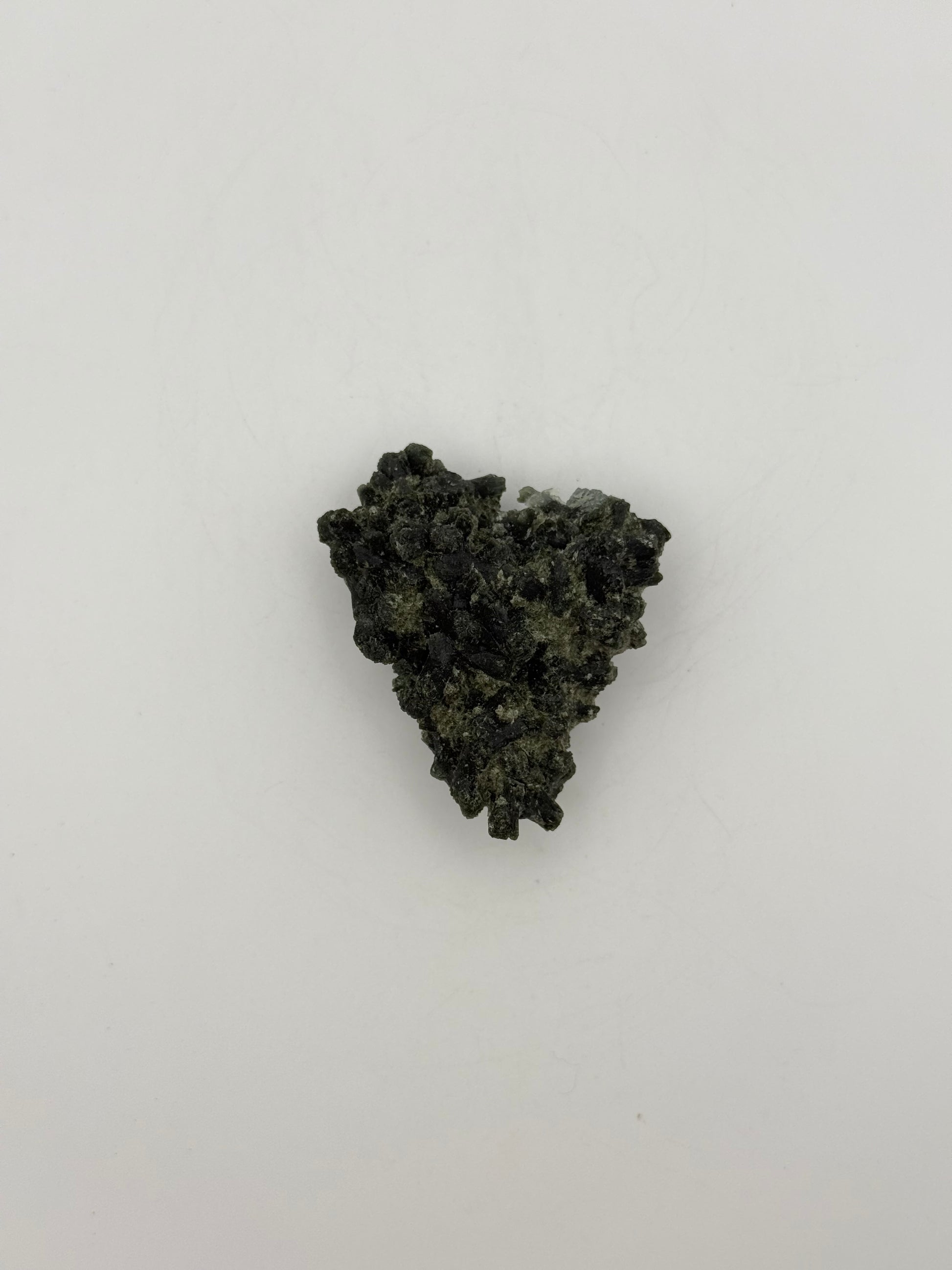 Raw prehnite specimen with amazing green color.