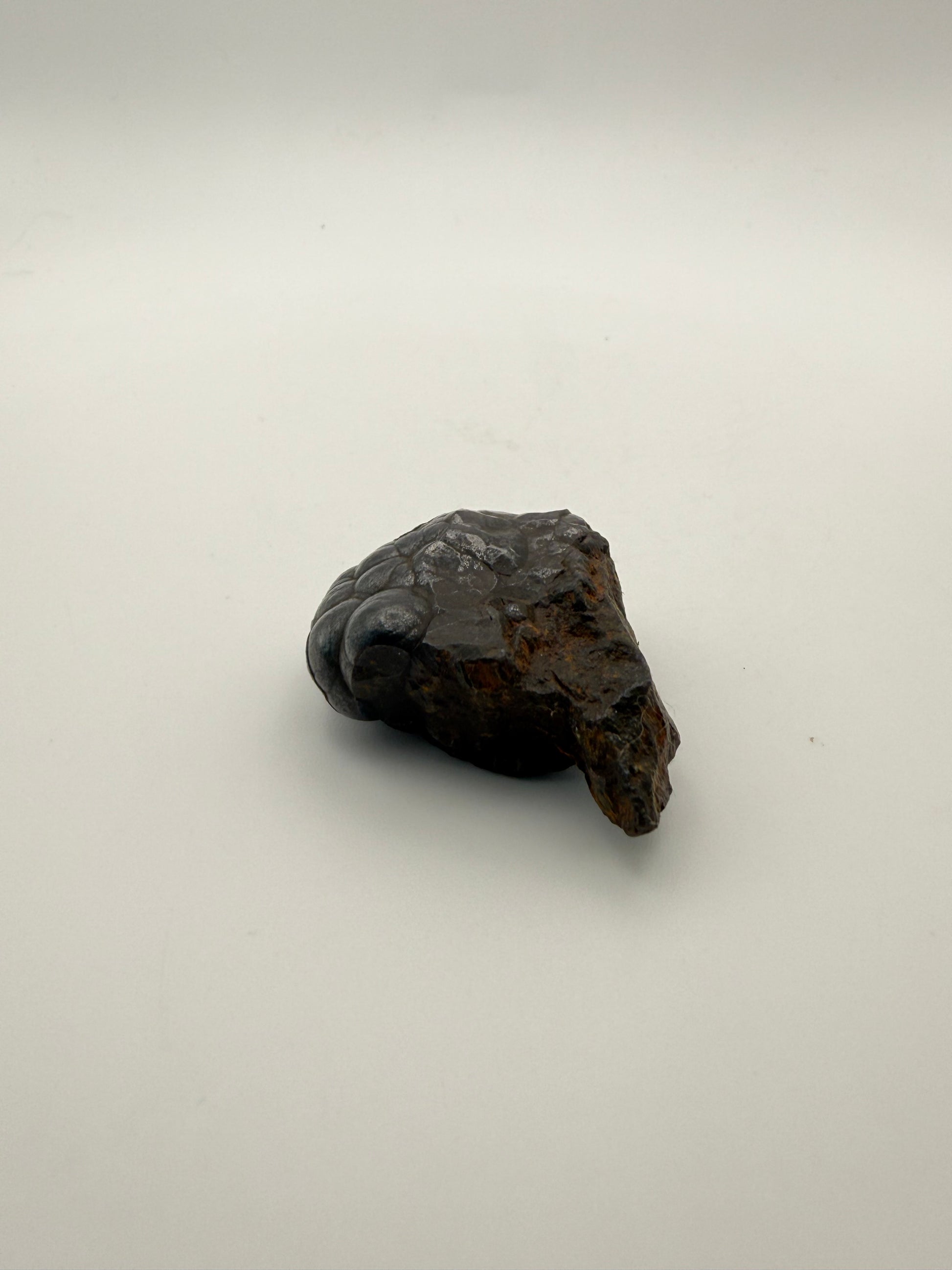 Small raw hematite specimen.