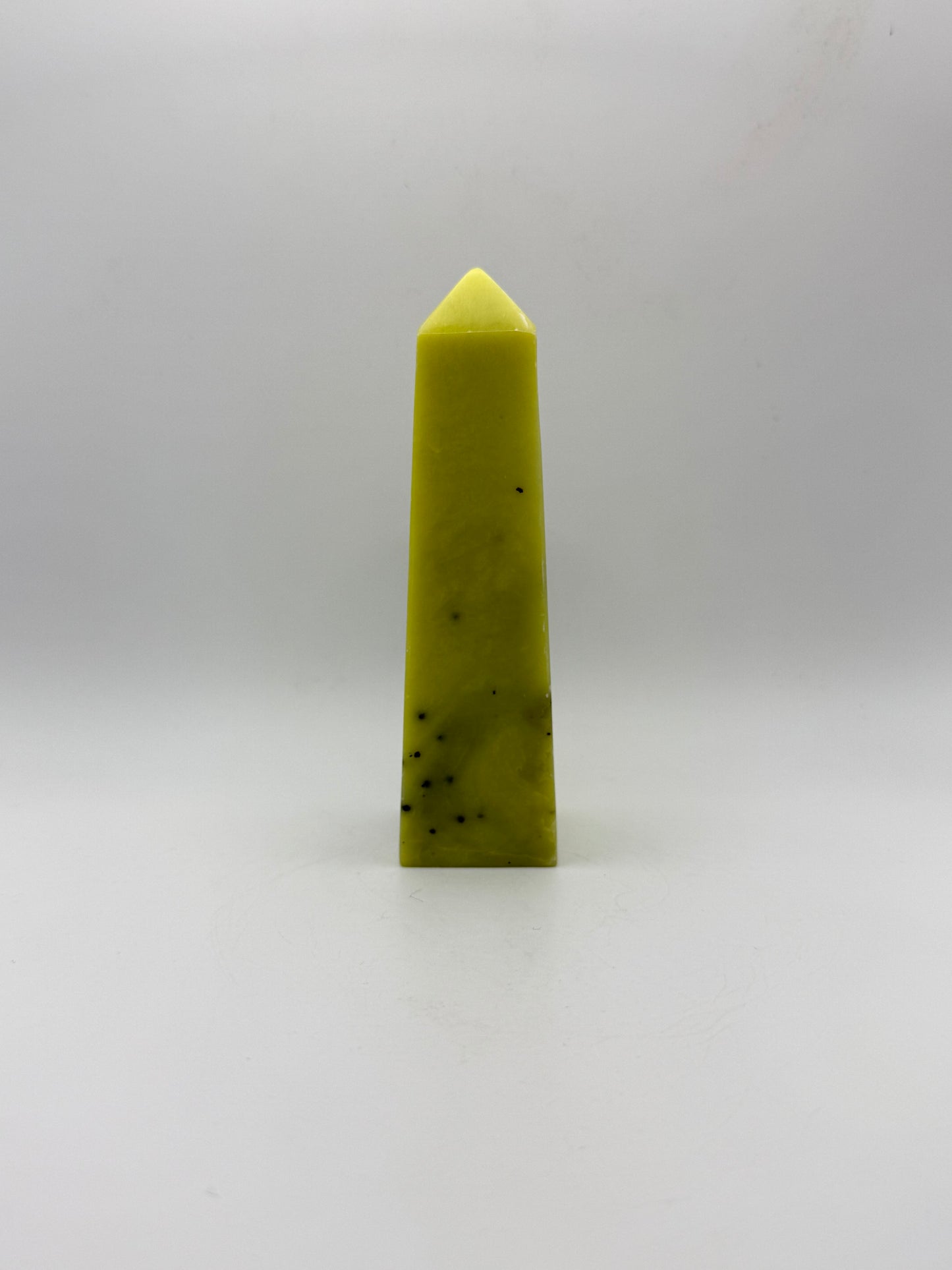 Polished healerite four sided tower.