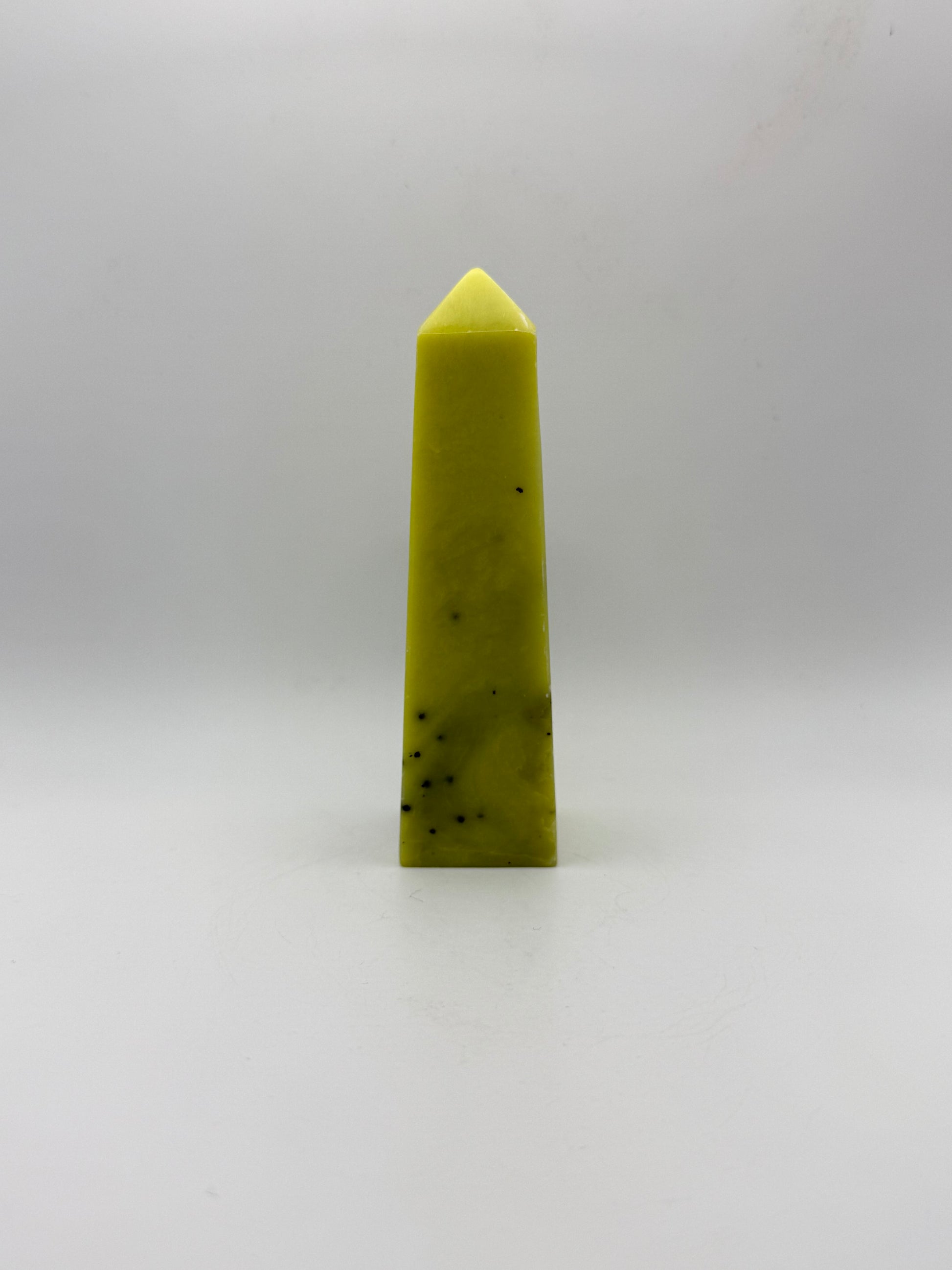 Polished healerite four sided tower.