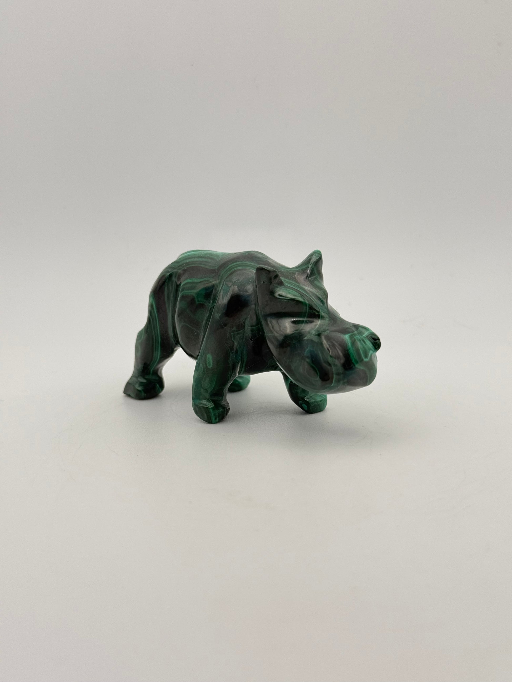 Malachite rhino carving.