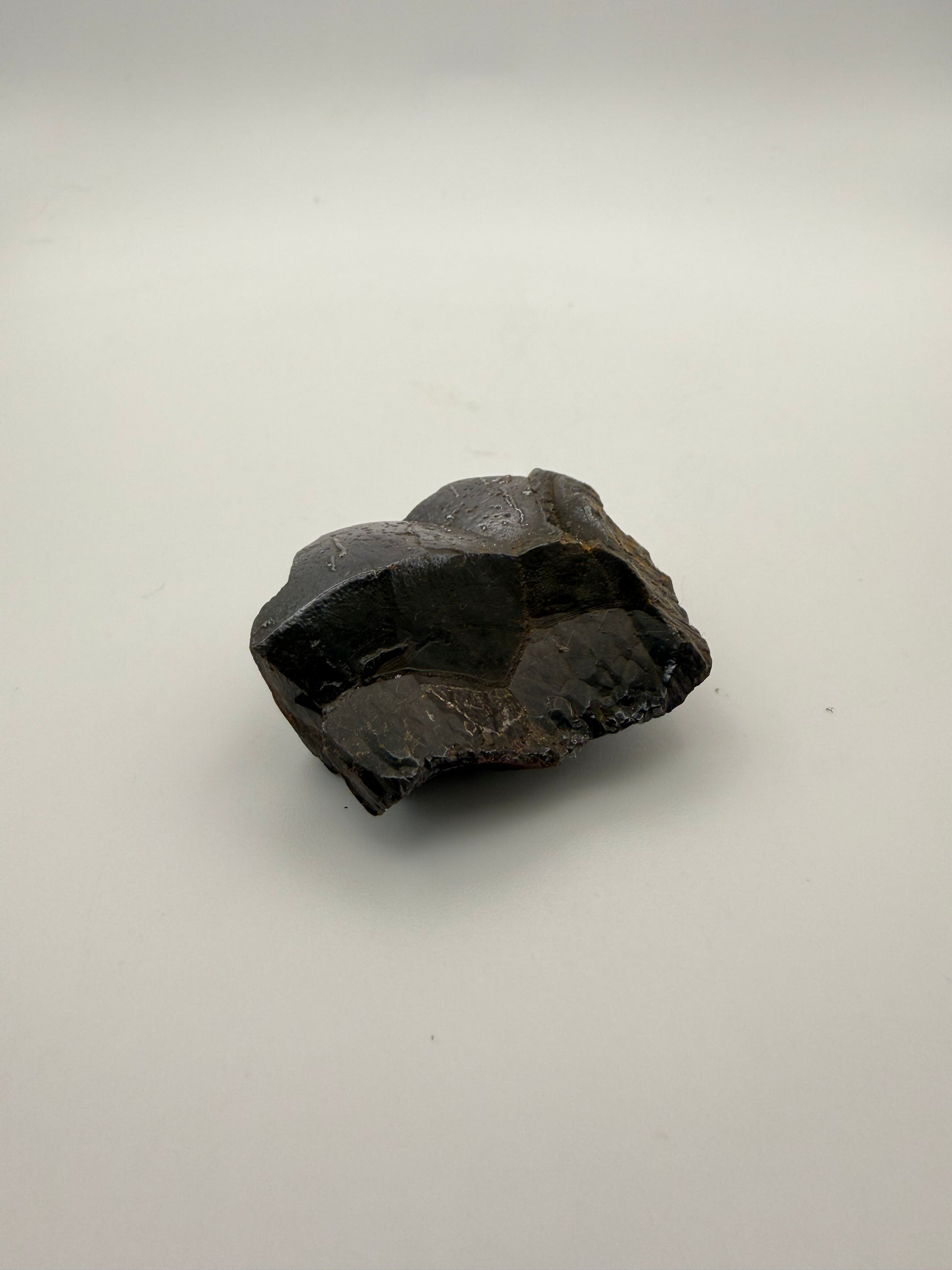 Small raw hematite specimen.