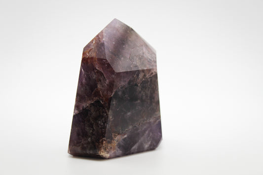 Polished super 7 in the shape of a tower.