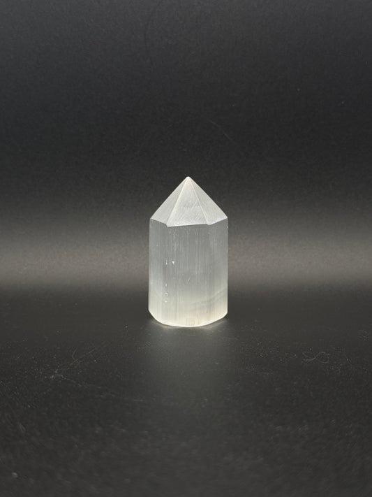 Selenite point that is 6cm tall.
