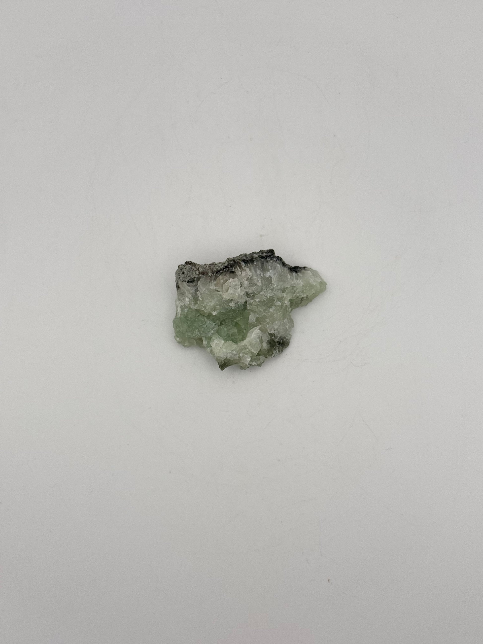 Raw prehnite specimen with amazing green color.
