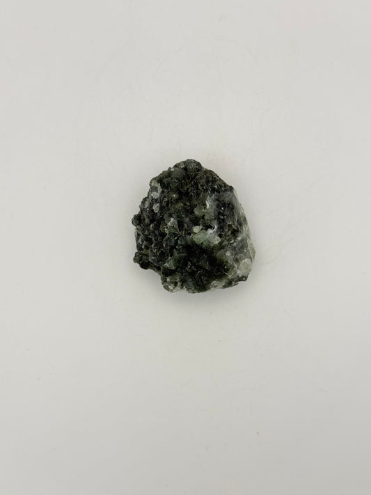 Raw Prehnite specimen with amazing green color.