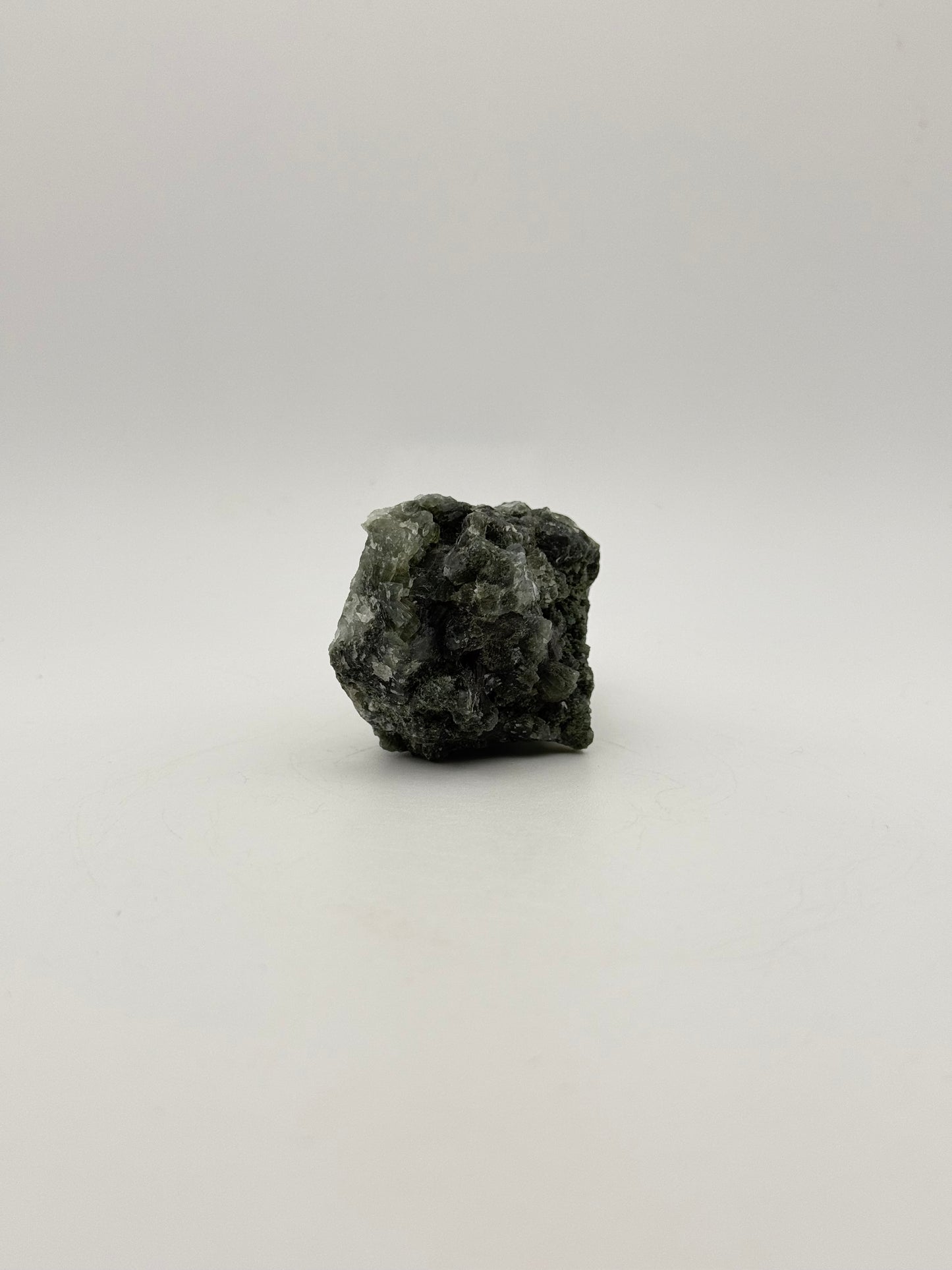 Raw prehnite specimen with amazing green color.