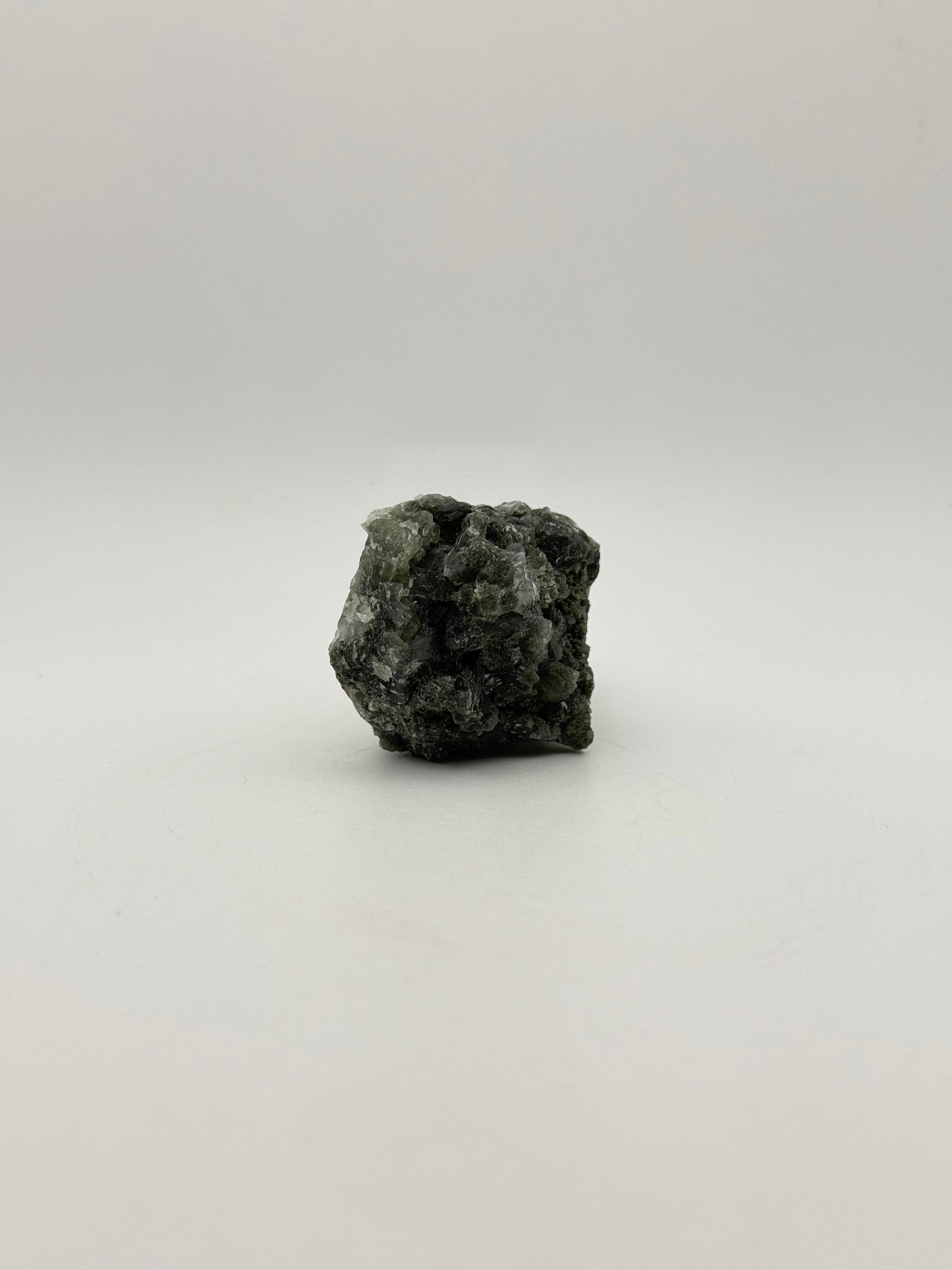 Raw prehnite specimen with amazing green color.