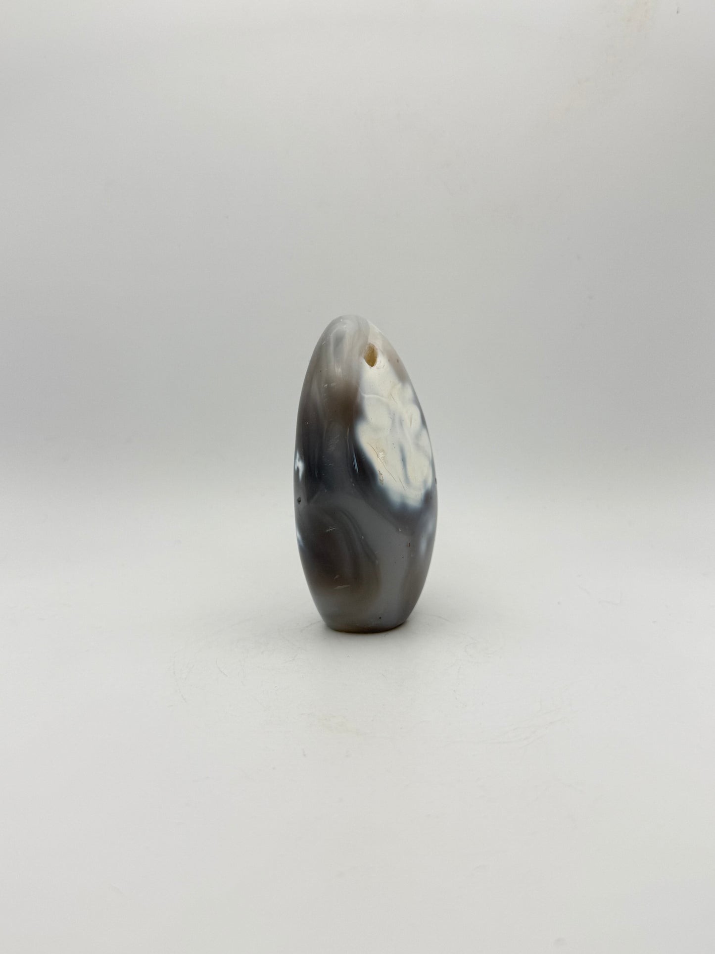 Polished orca agate free form.