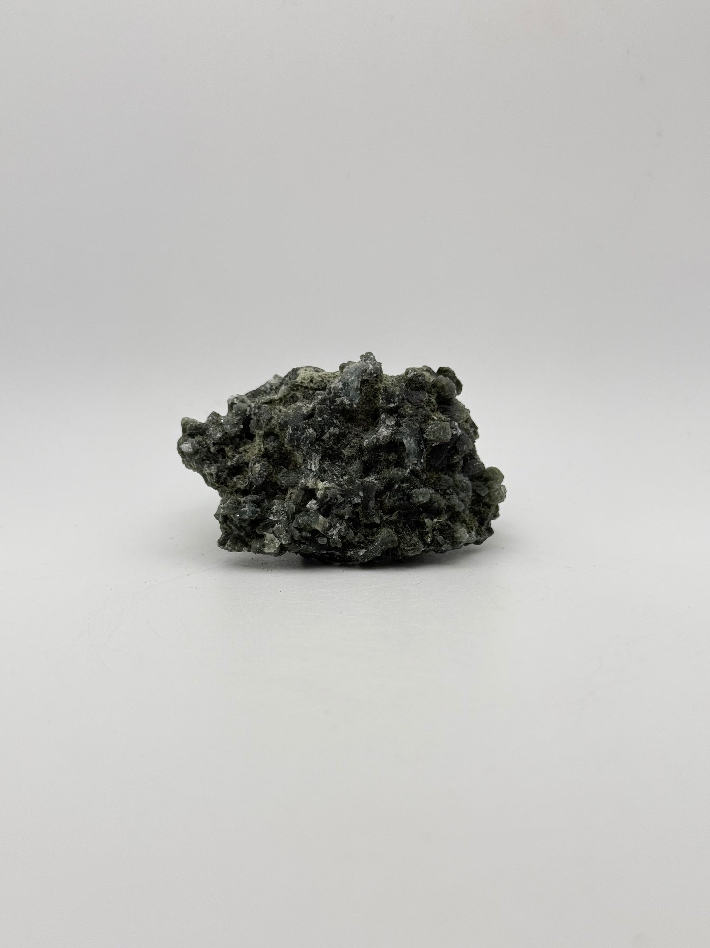 Raw prehnite specimen with amazing green color.