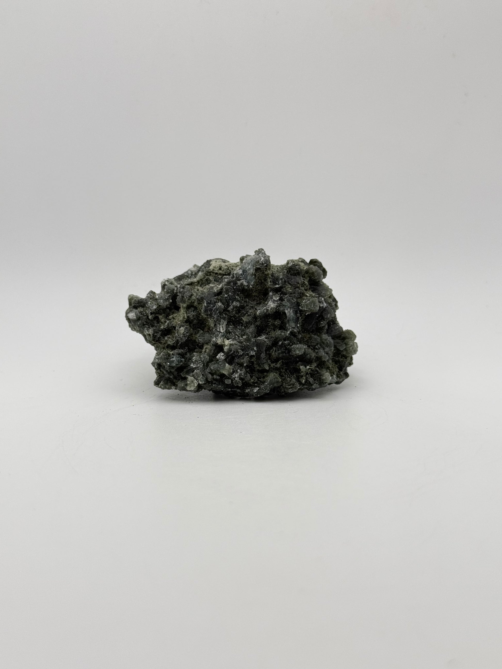 Raw prehnite specimen with amazing green color.