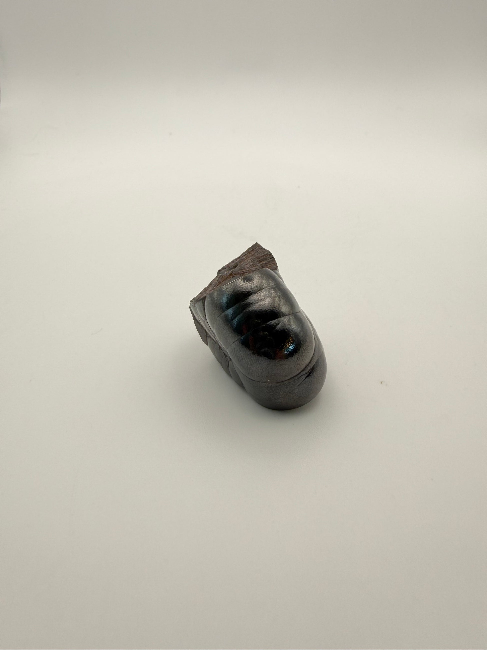 Small raw hematite specimen.