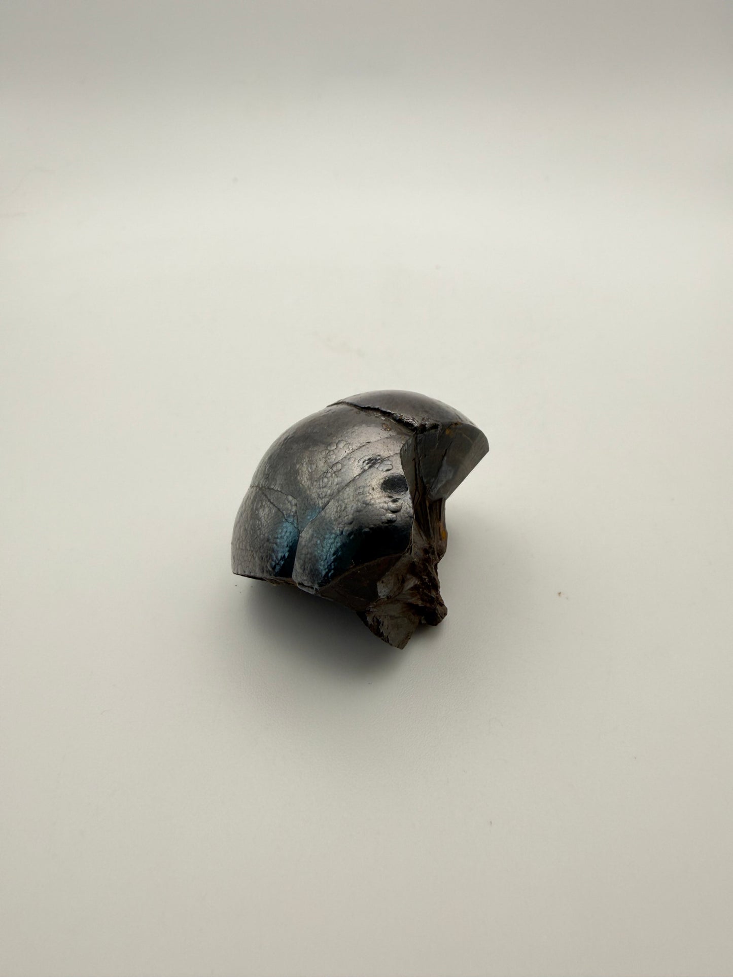 Small raw hematite specimen.