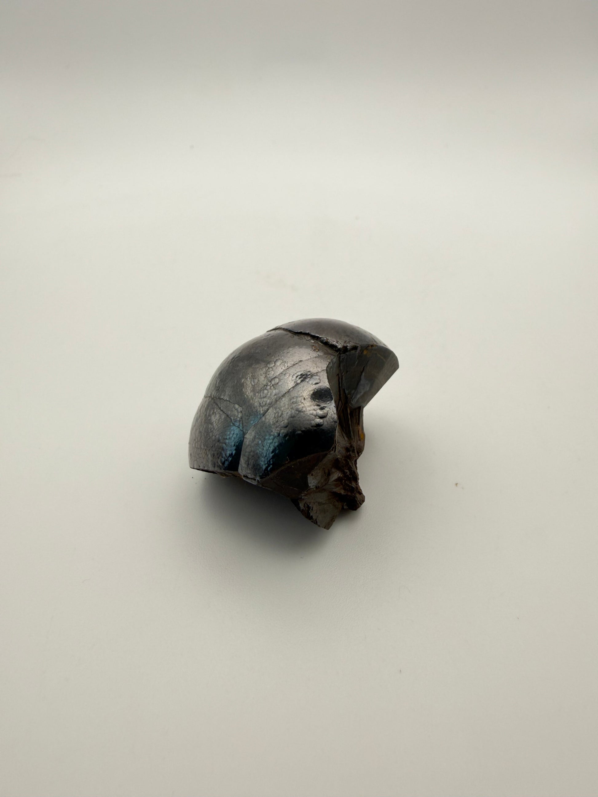 Small raw hematite specimen.