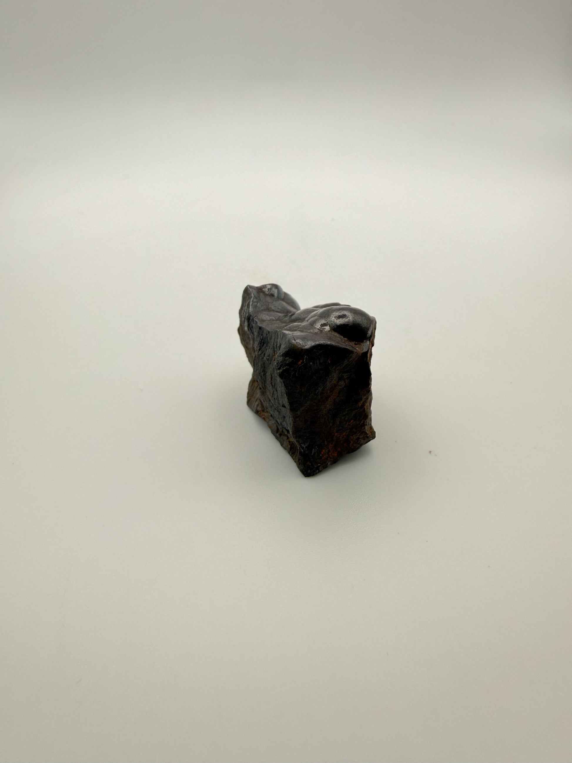Small raw hematite specimen.