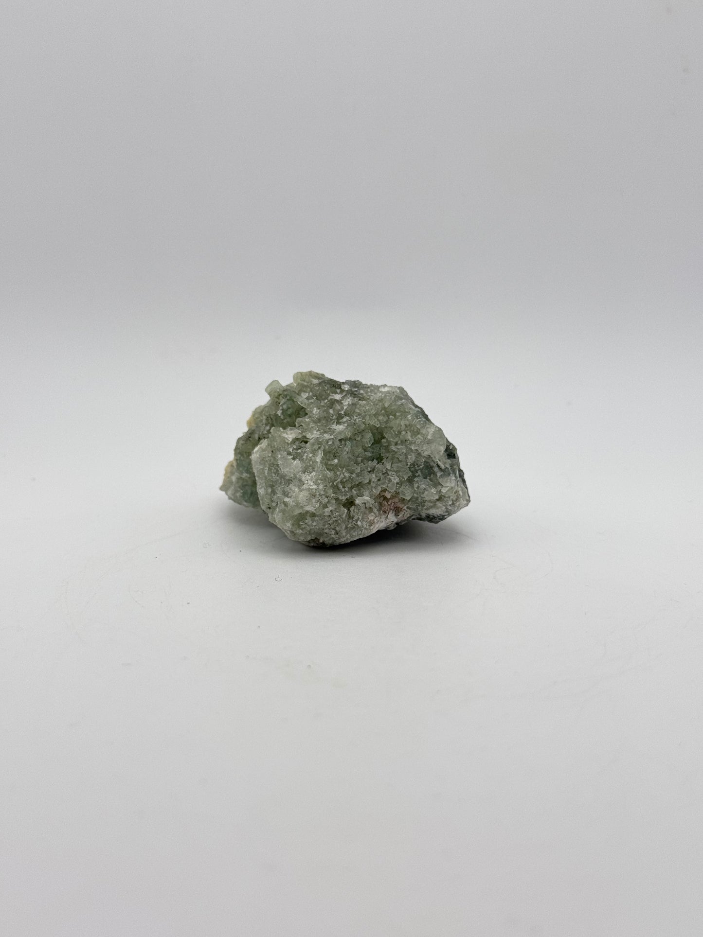 Raw prehnite specimen with amazing green color.