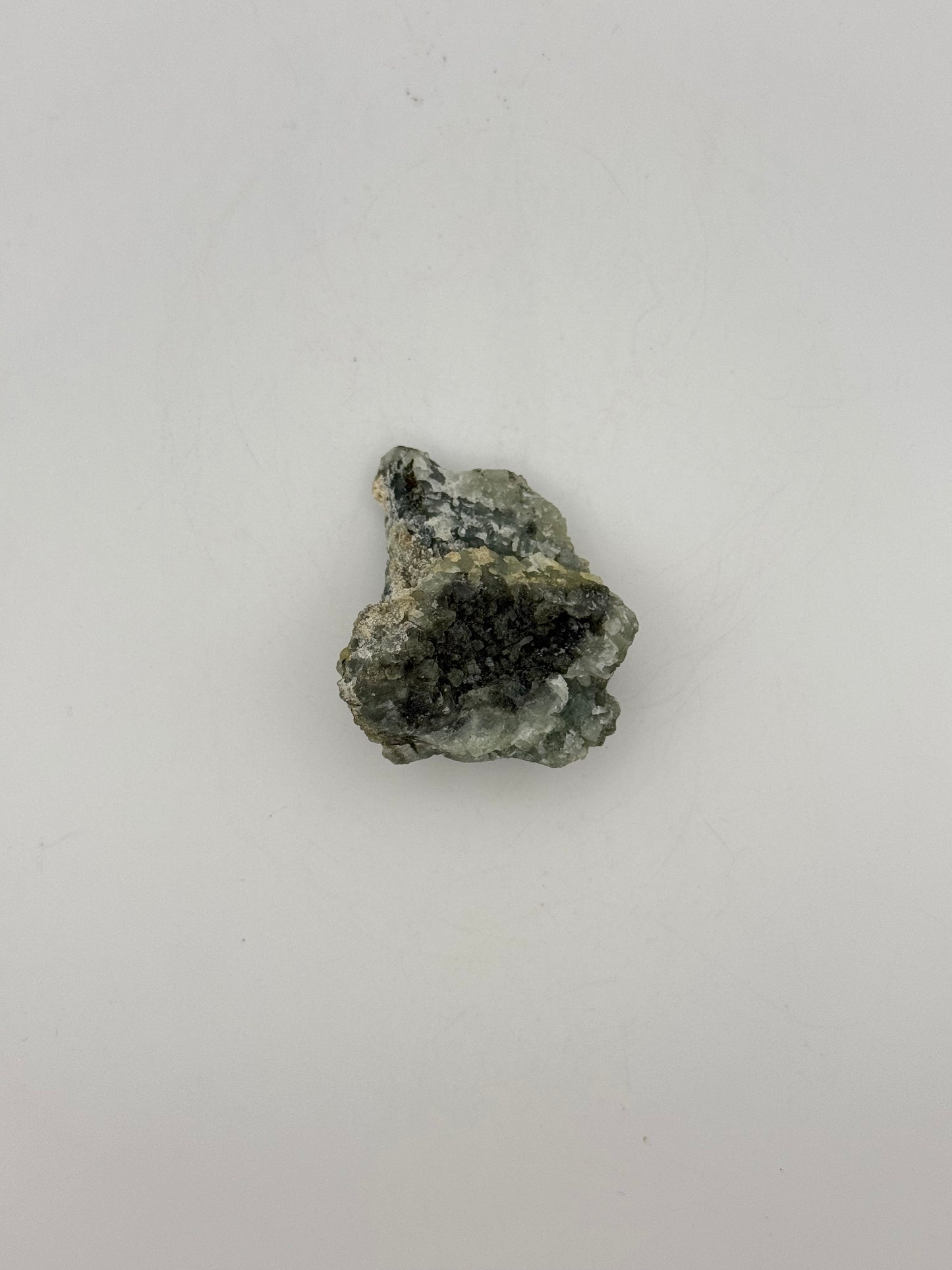 Raw prehnite specimen with amazing green color.