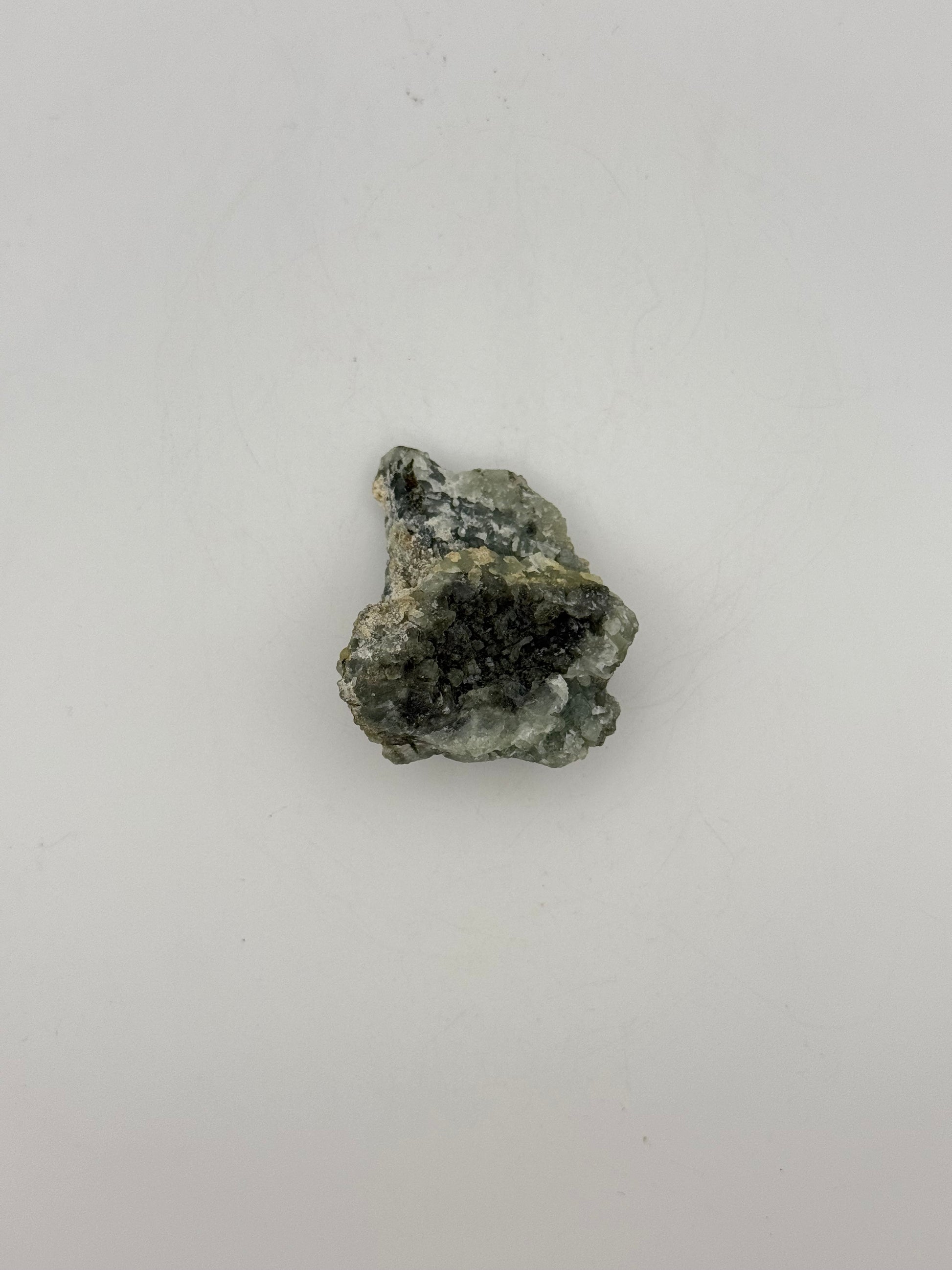 Raw prehnite specimen with amazing green color.