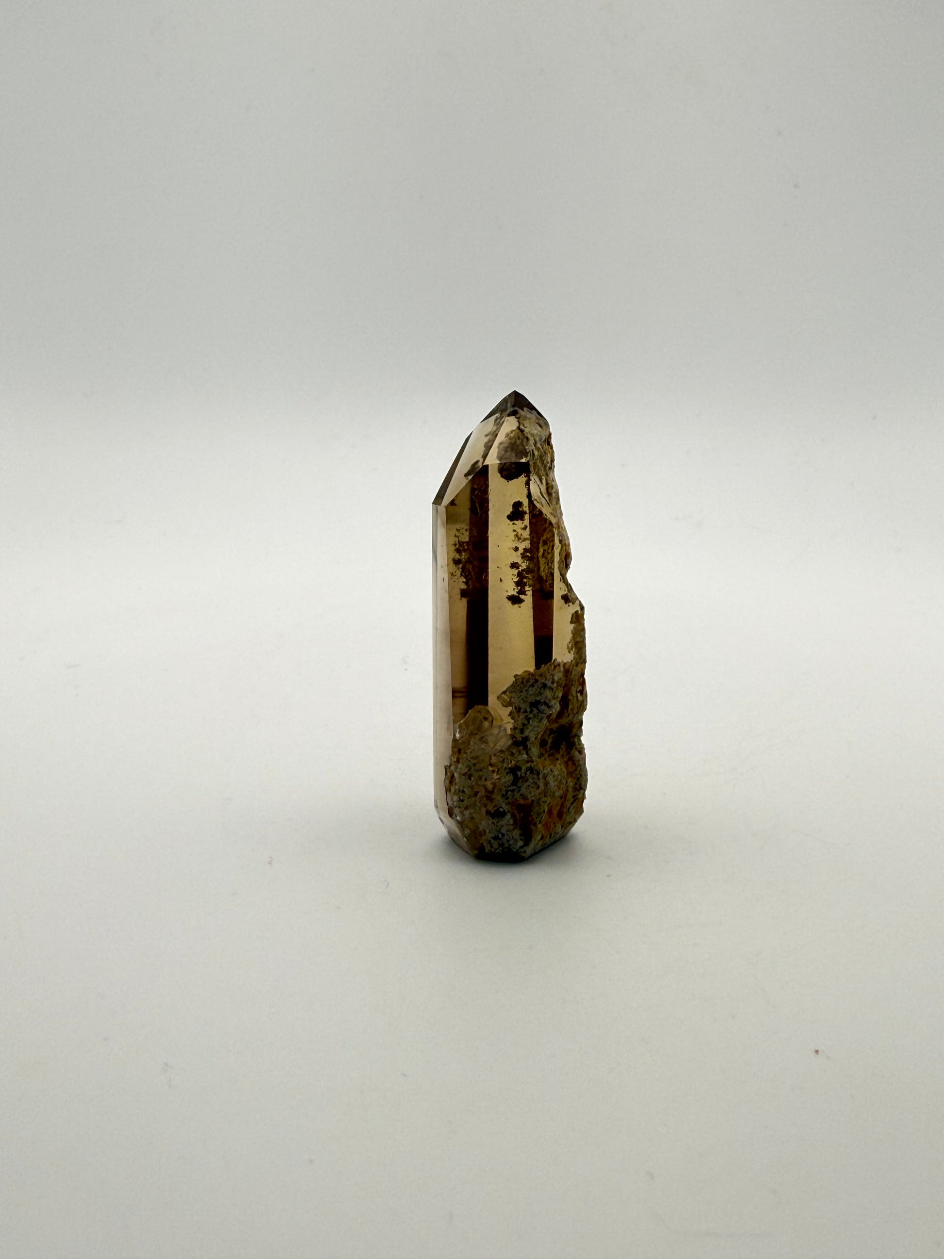 Polished natural citrine point.