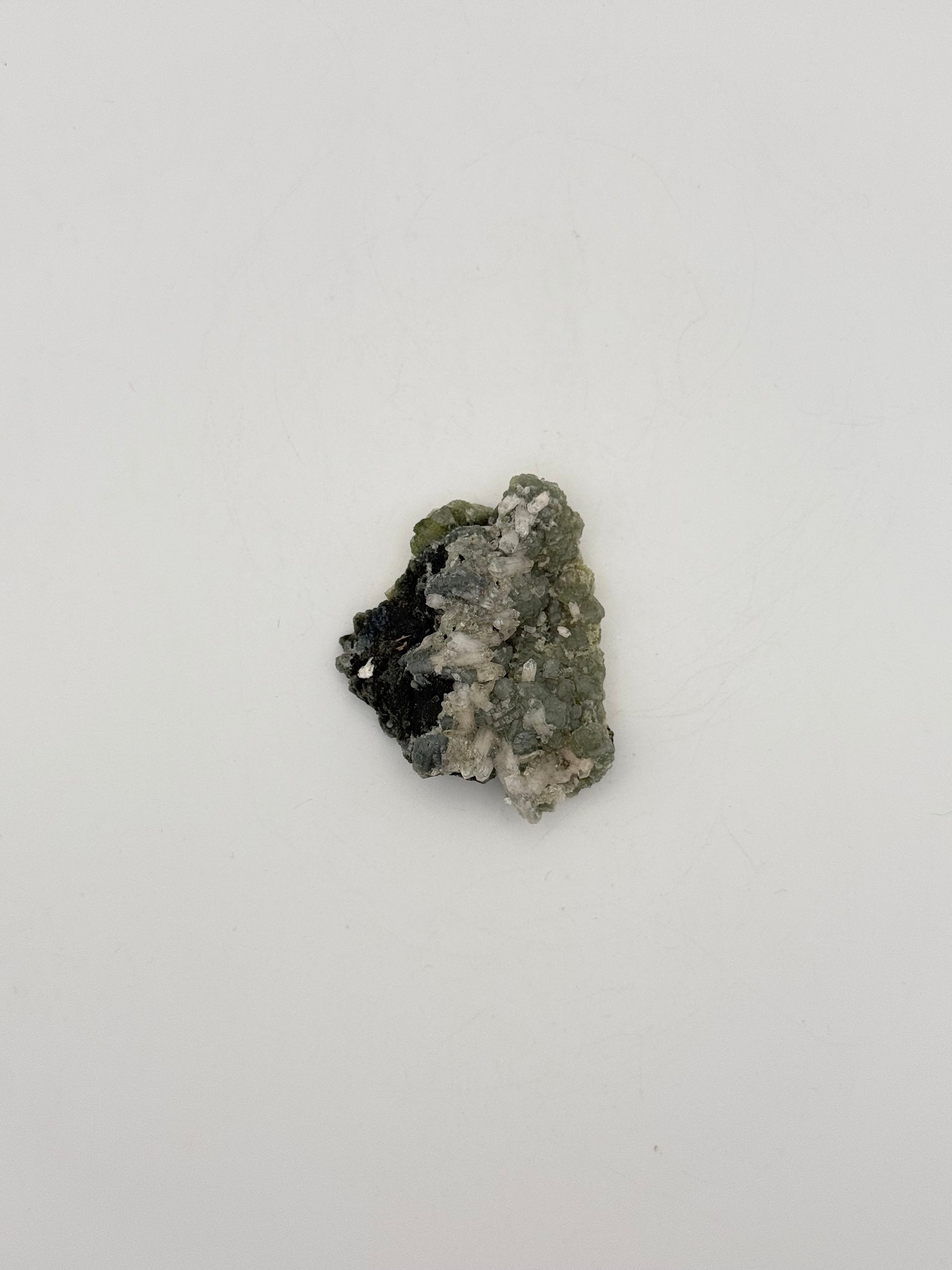 Raw prehnite specimen with amazing green color.