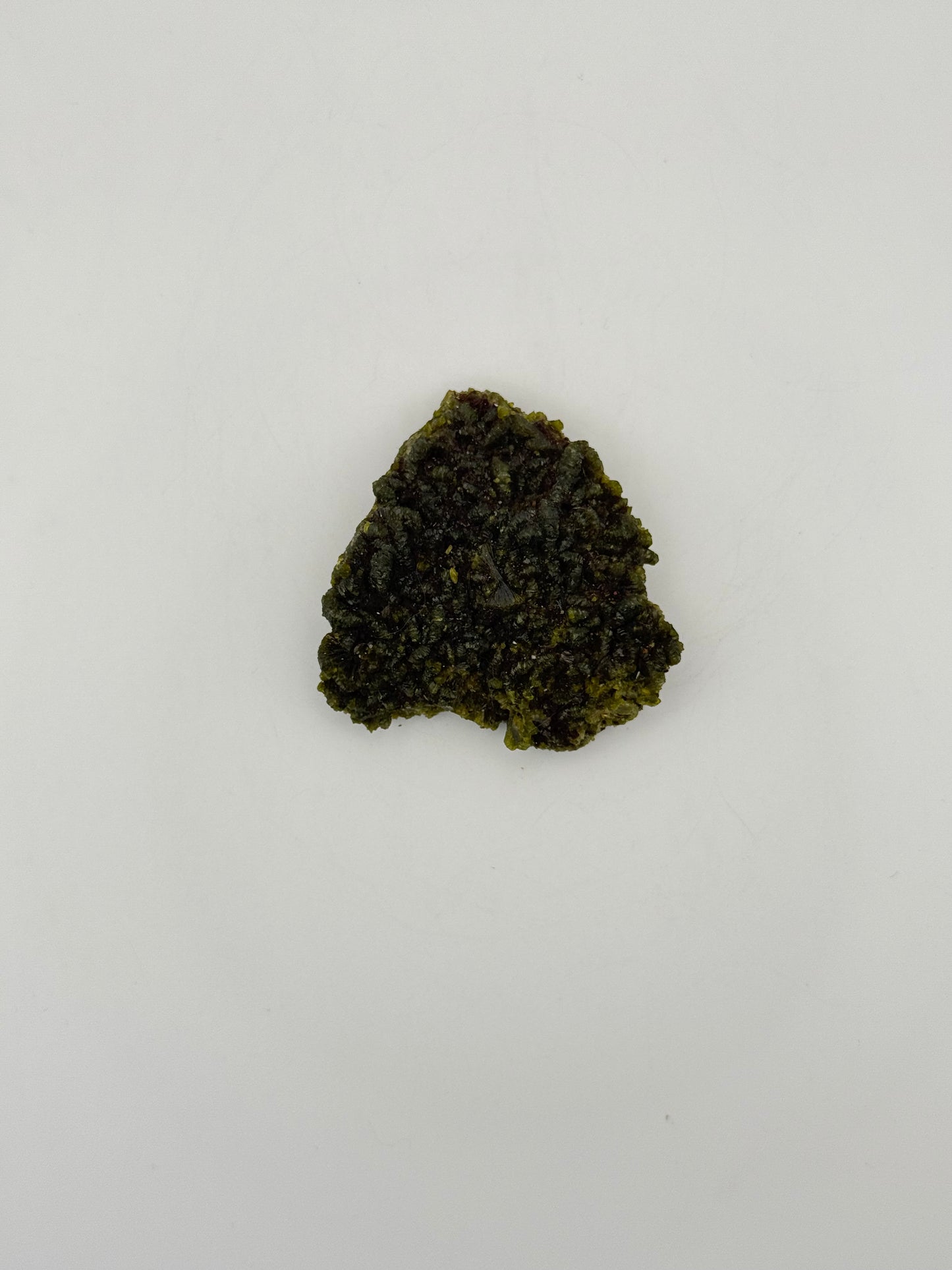 Epidote crystal cluster with good green color.