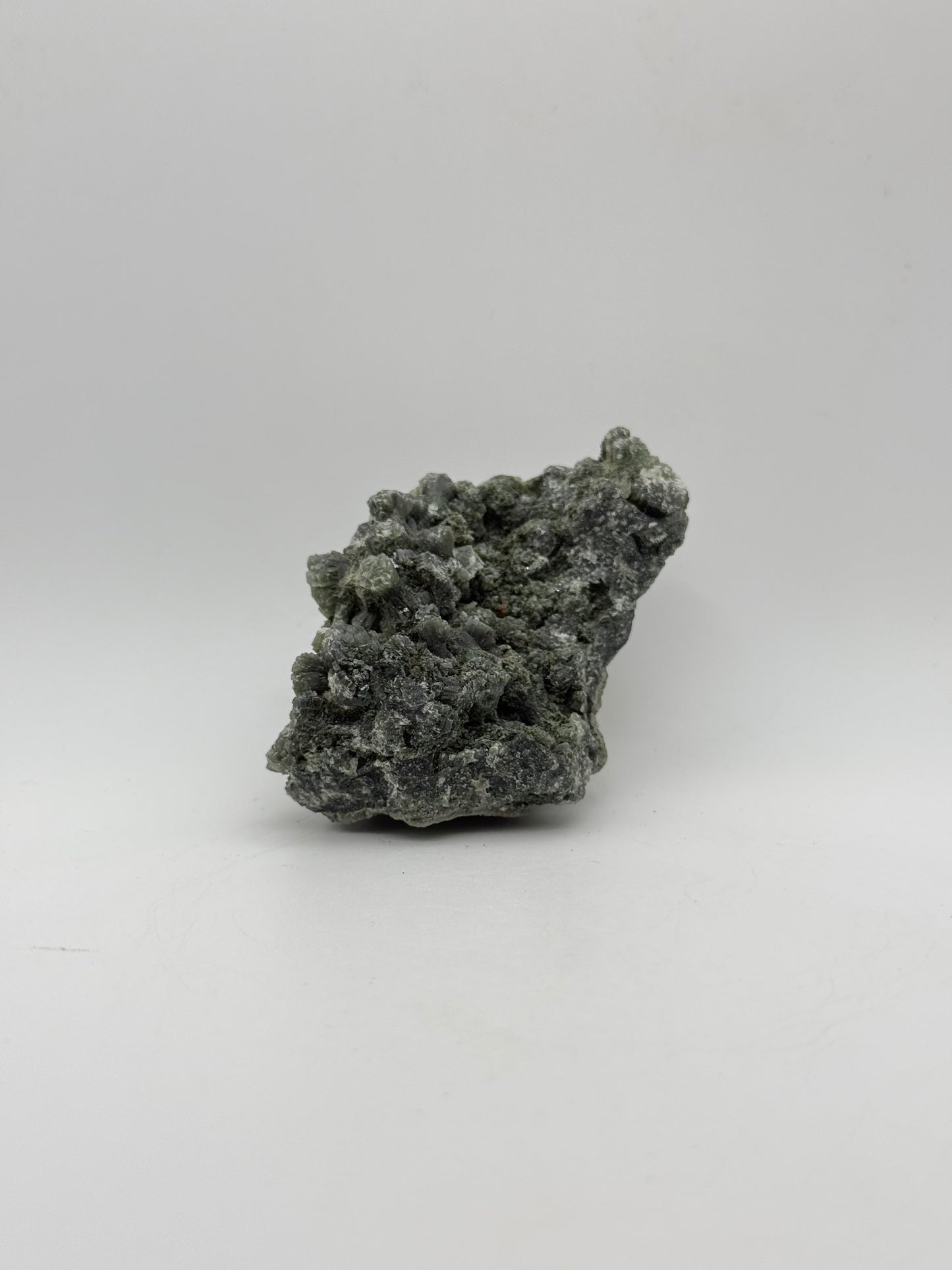 Raw prehnite specimen with amazing green color.