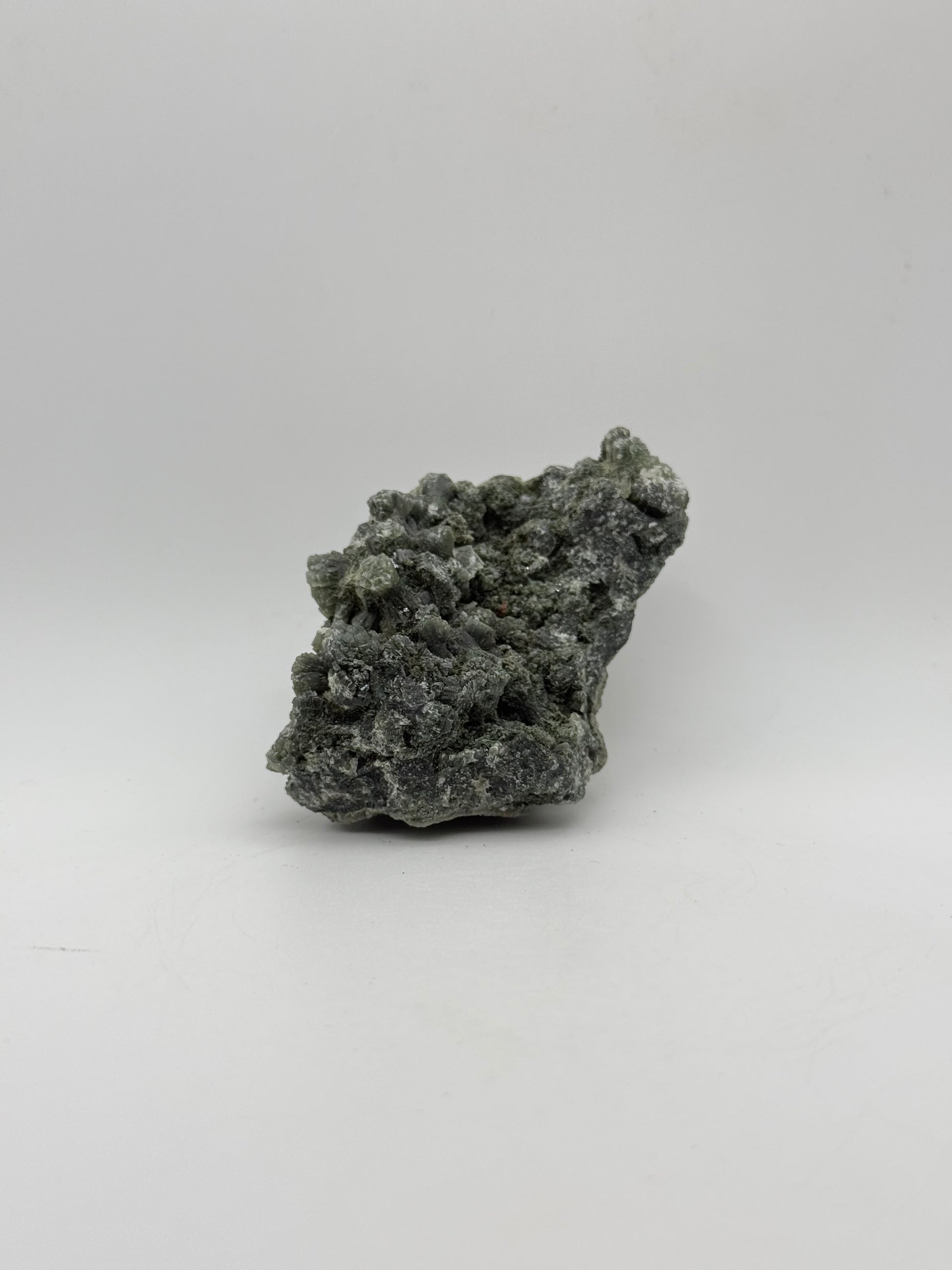 Raw prehnite specimen with amazing green color.