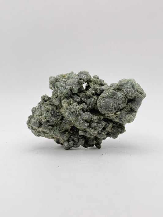 Raw prehnite specimen with amazing green color.