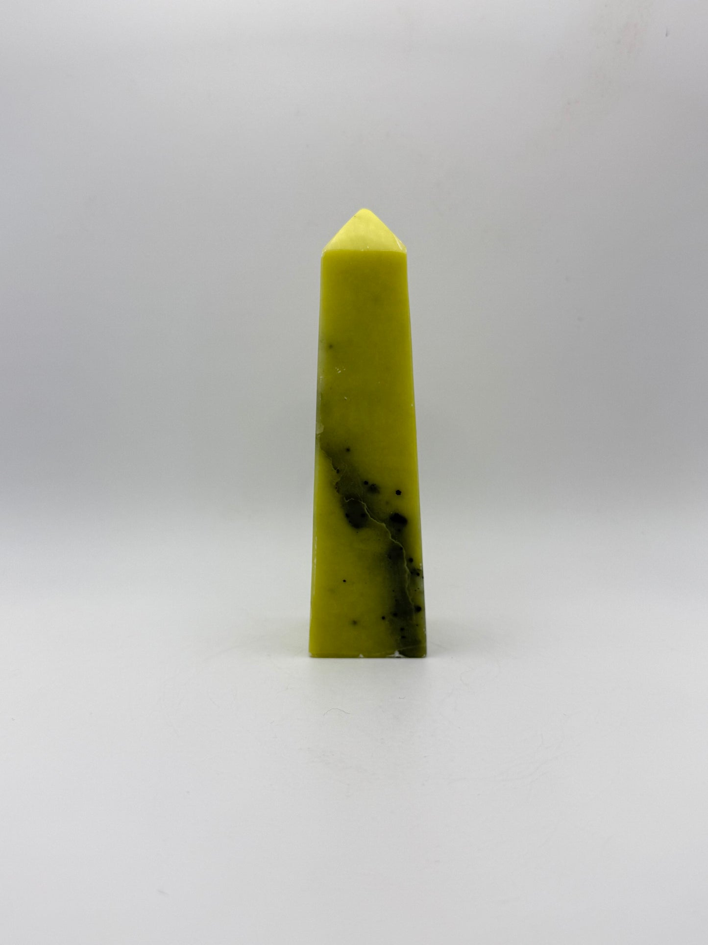 Polished healerite four sided tower.