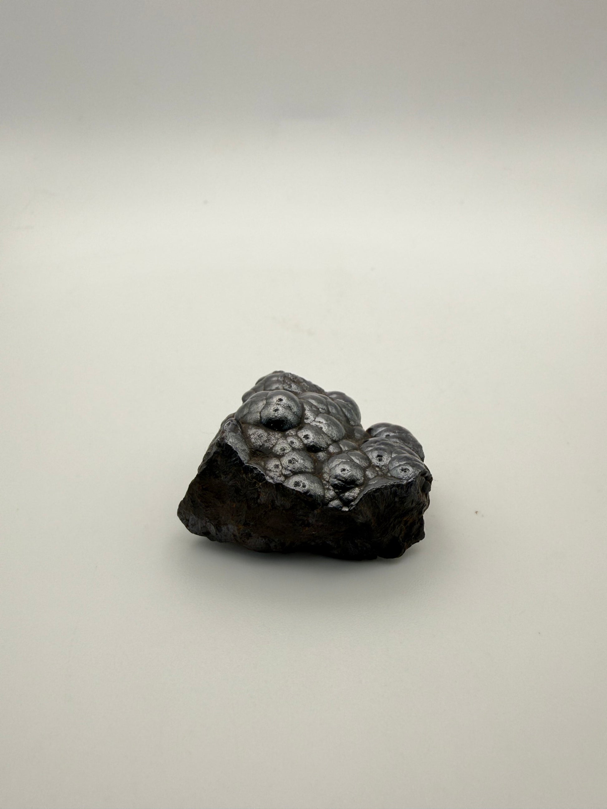 Small raw hematite specimen.