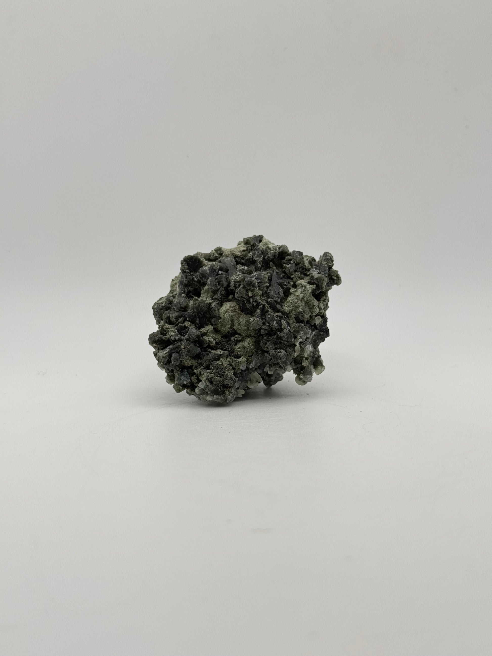 Raw prehnite specimen with amazing green color.