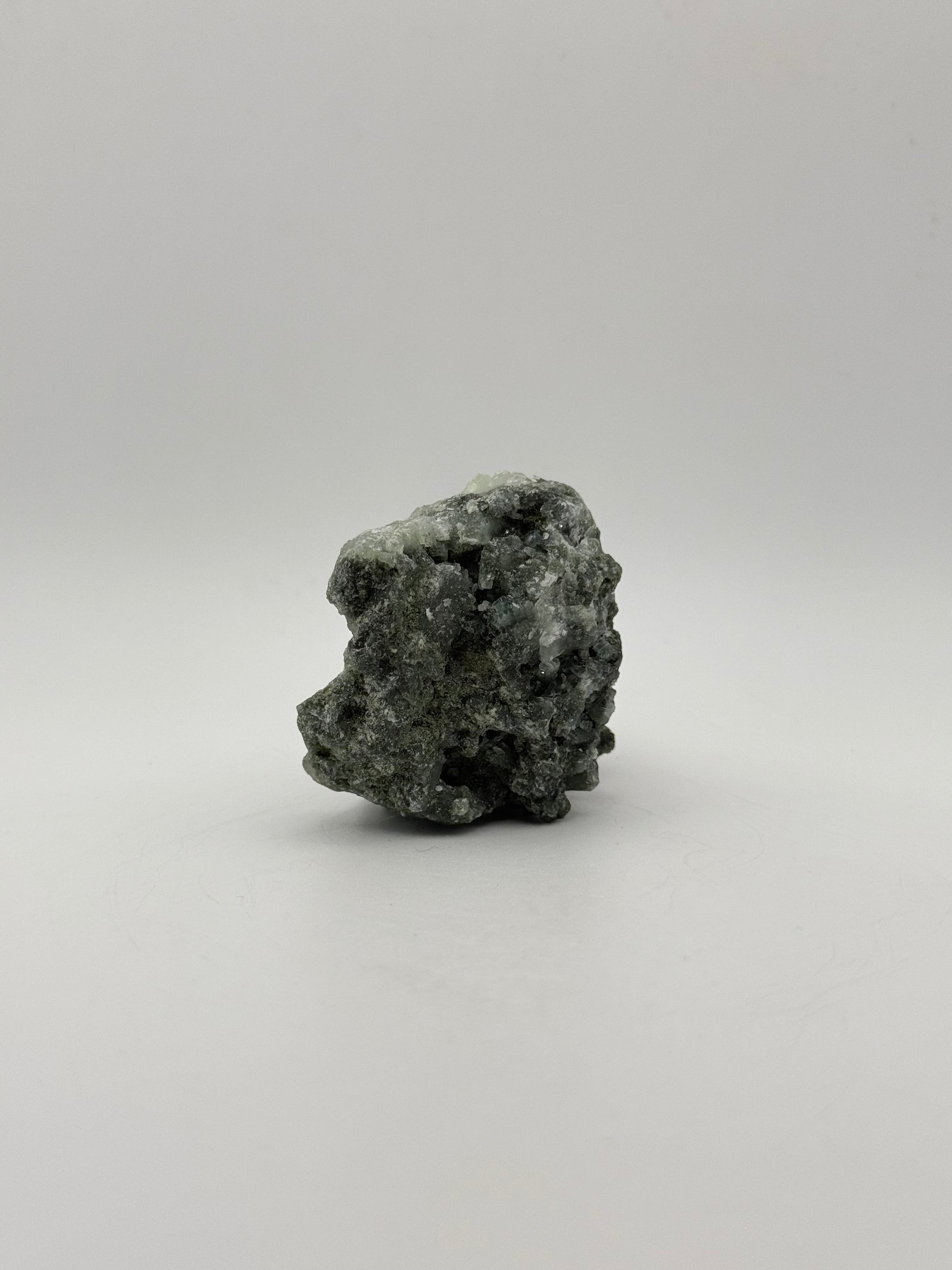 Raw prehnite specimen with amazing green color.