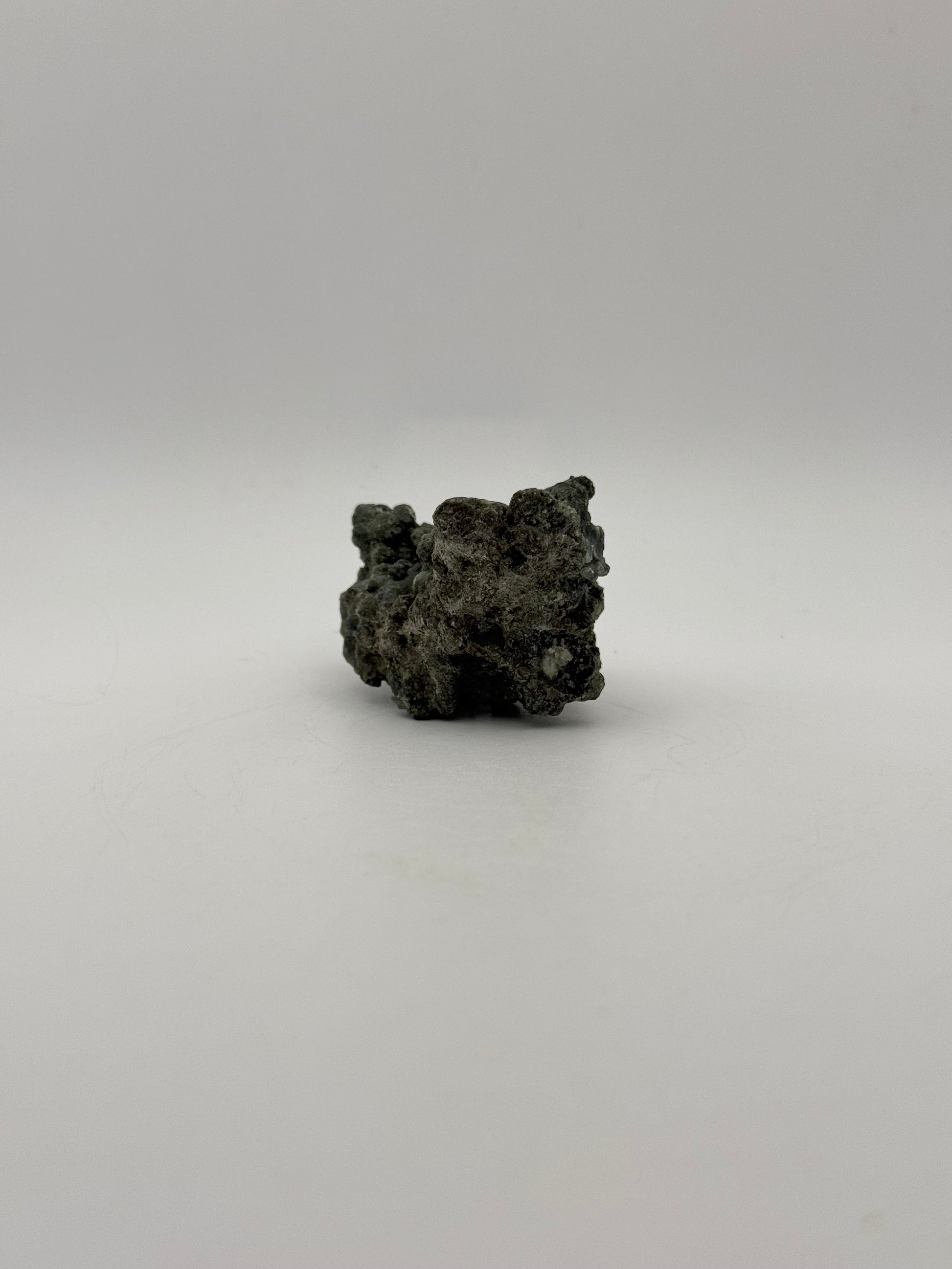 Raw prehnite specimen with amazing green color.