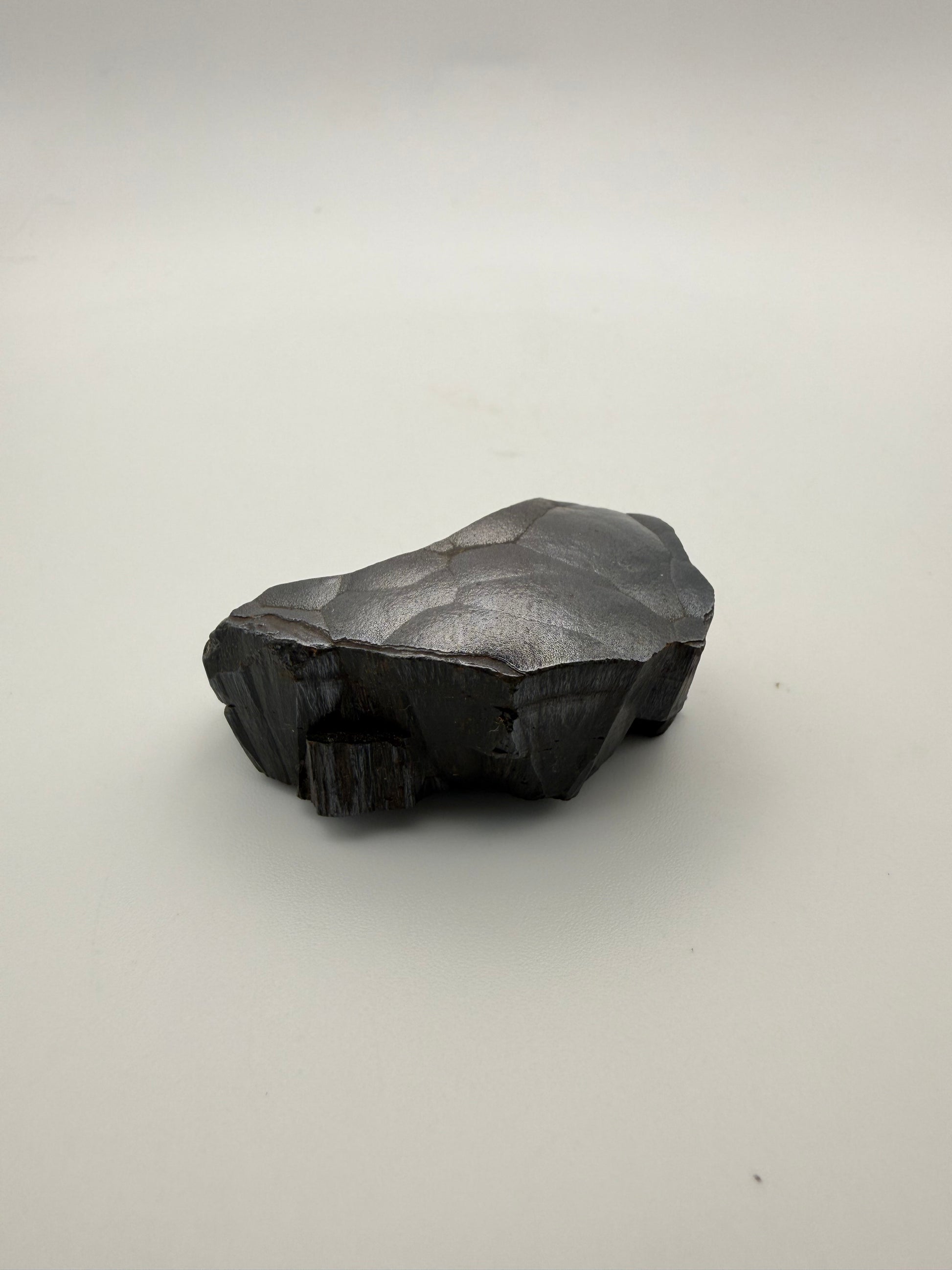 Small raw hematite specimen.