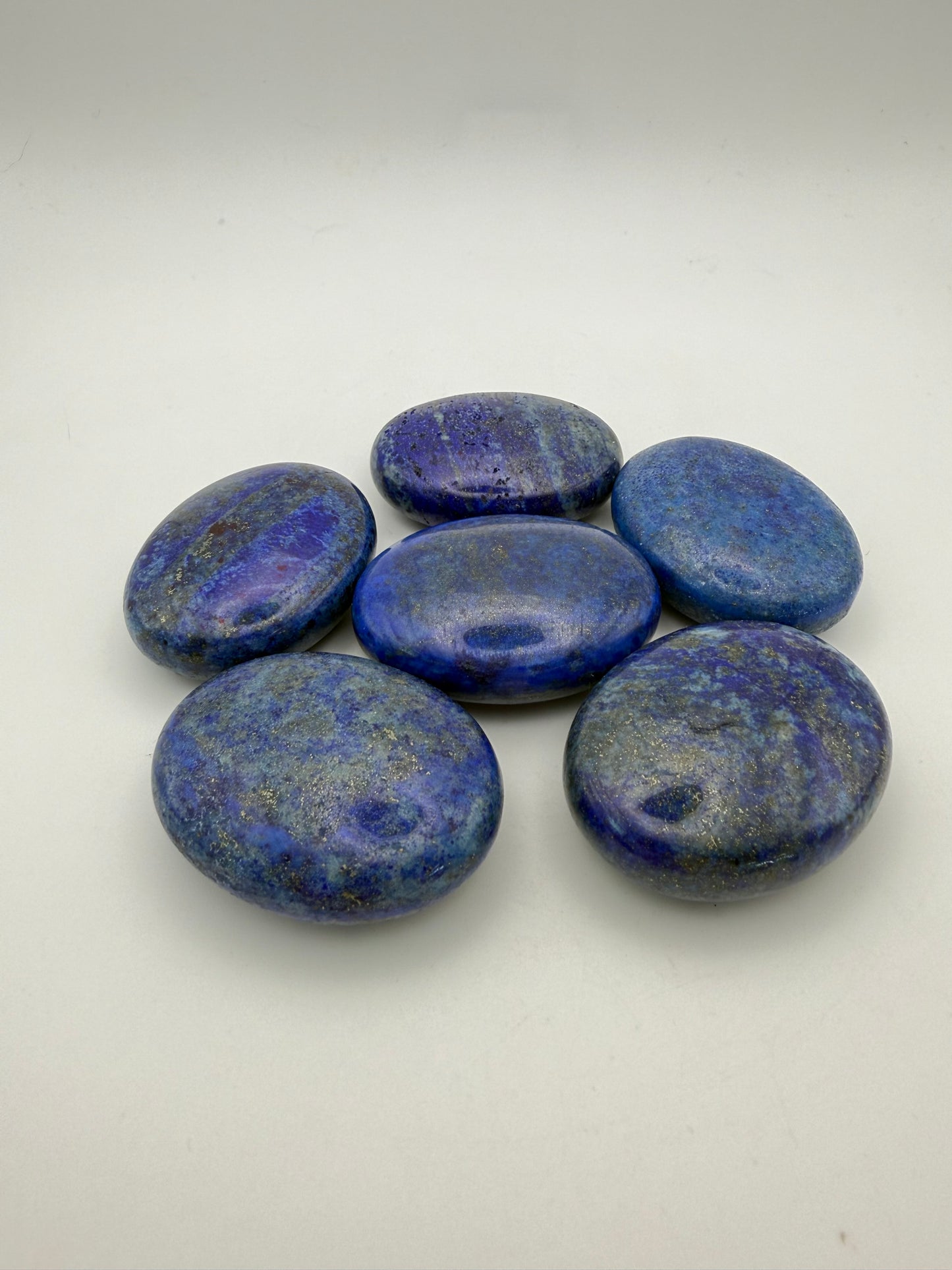 Polished Lapis Lazuli palm stone.