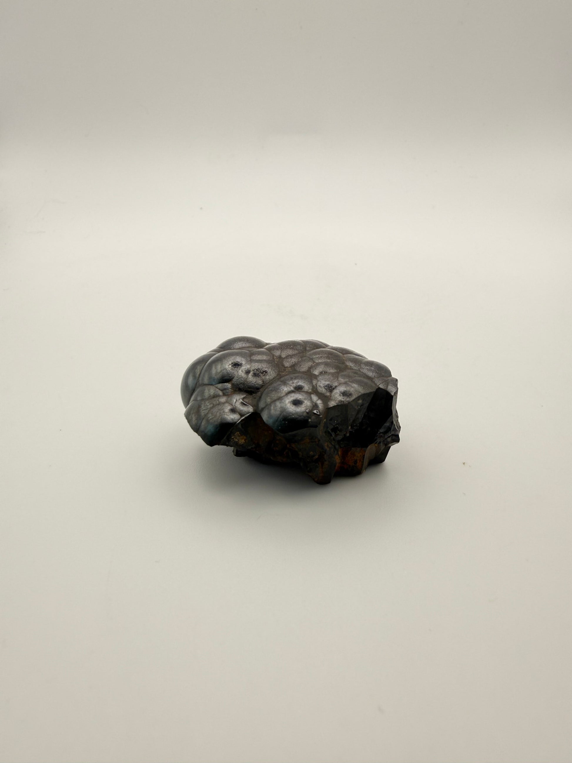 Small raw hematite specimen.