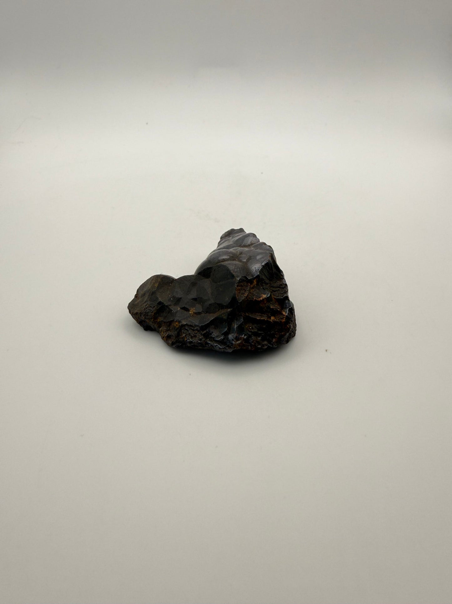 Small raw hematite specimen.