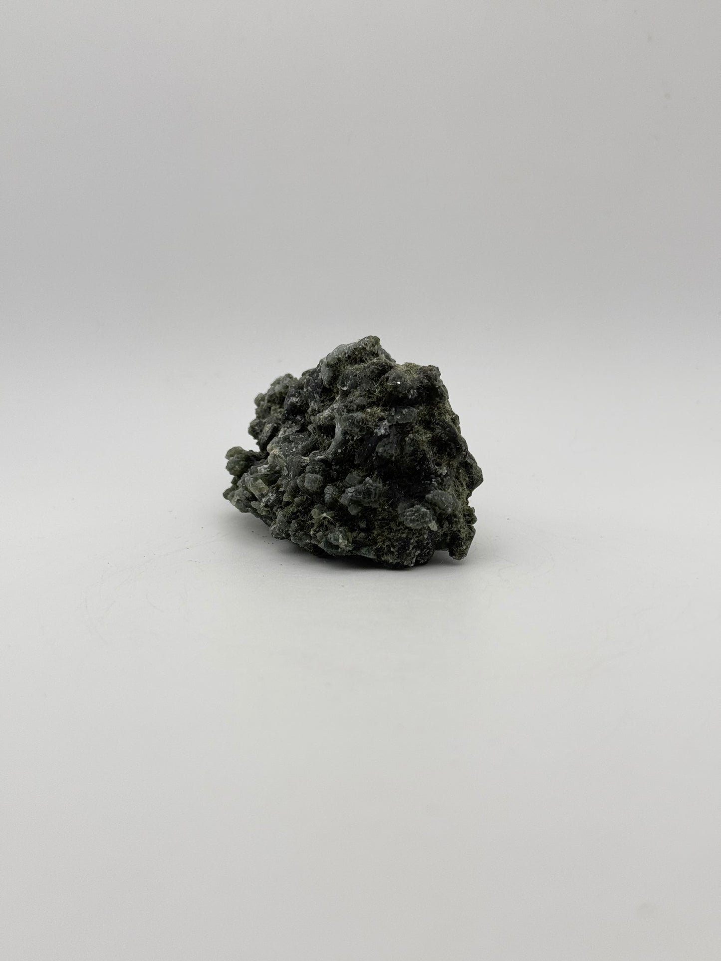 Raw prehnite specimen with amazing green color.