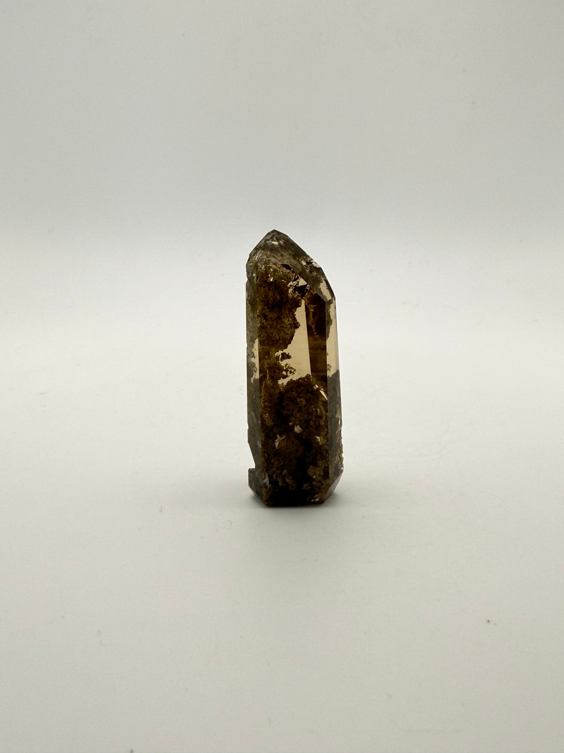 Polished natural citrine point.