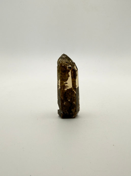 Polished natural citrine point.