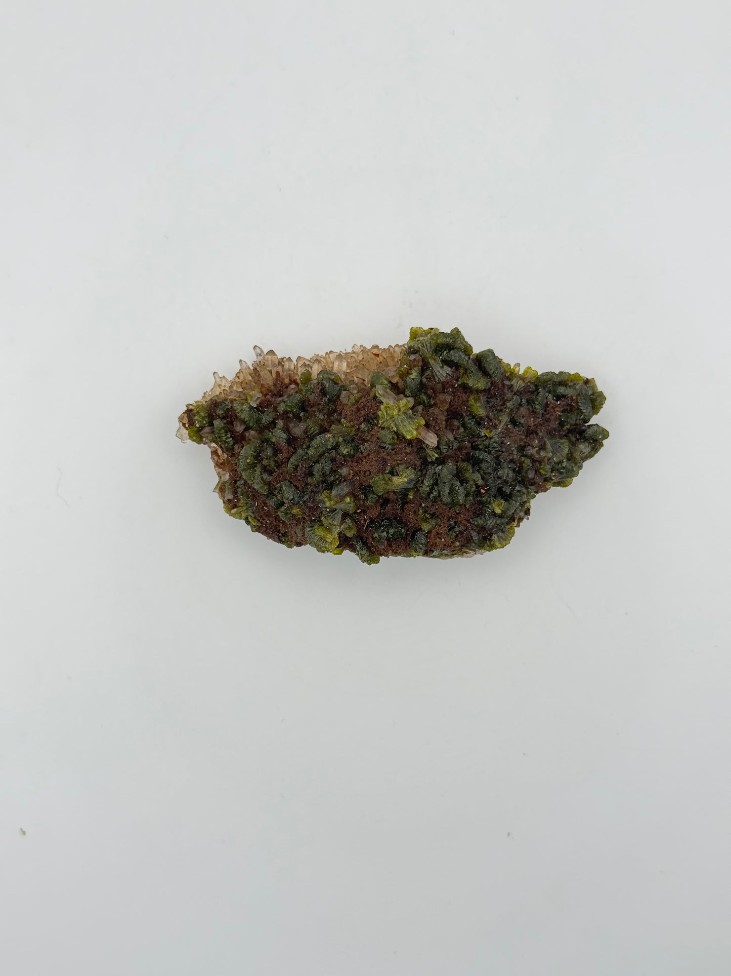 Epidote crystal cluster with good green color.