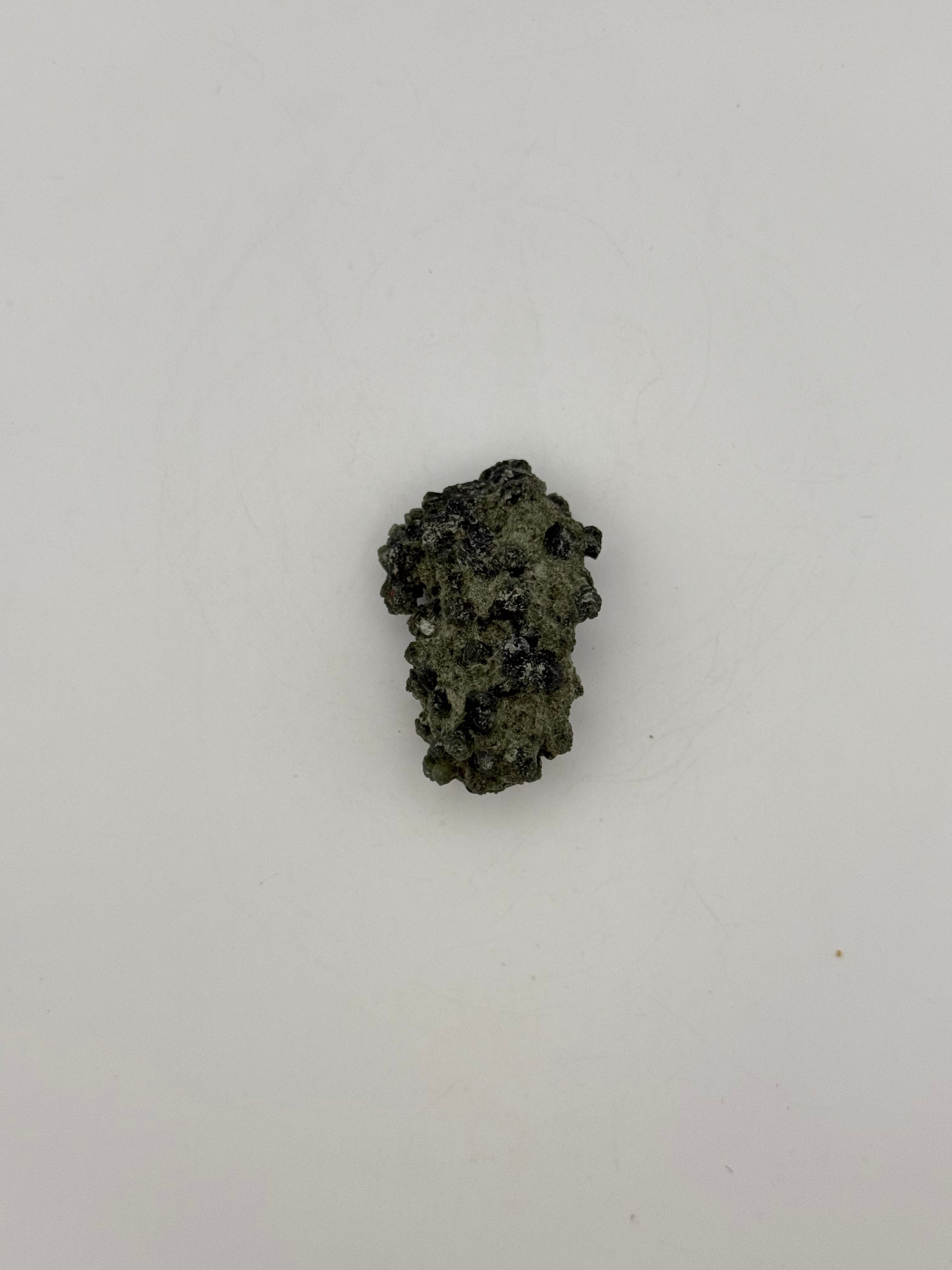 Raw prehnite specimen with amazing green color.