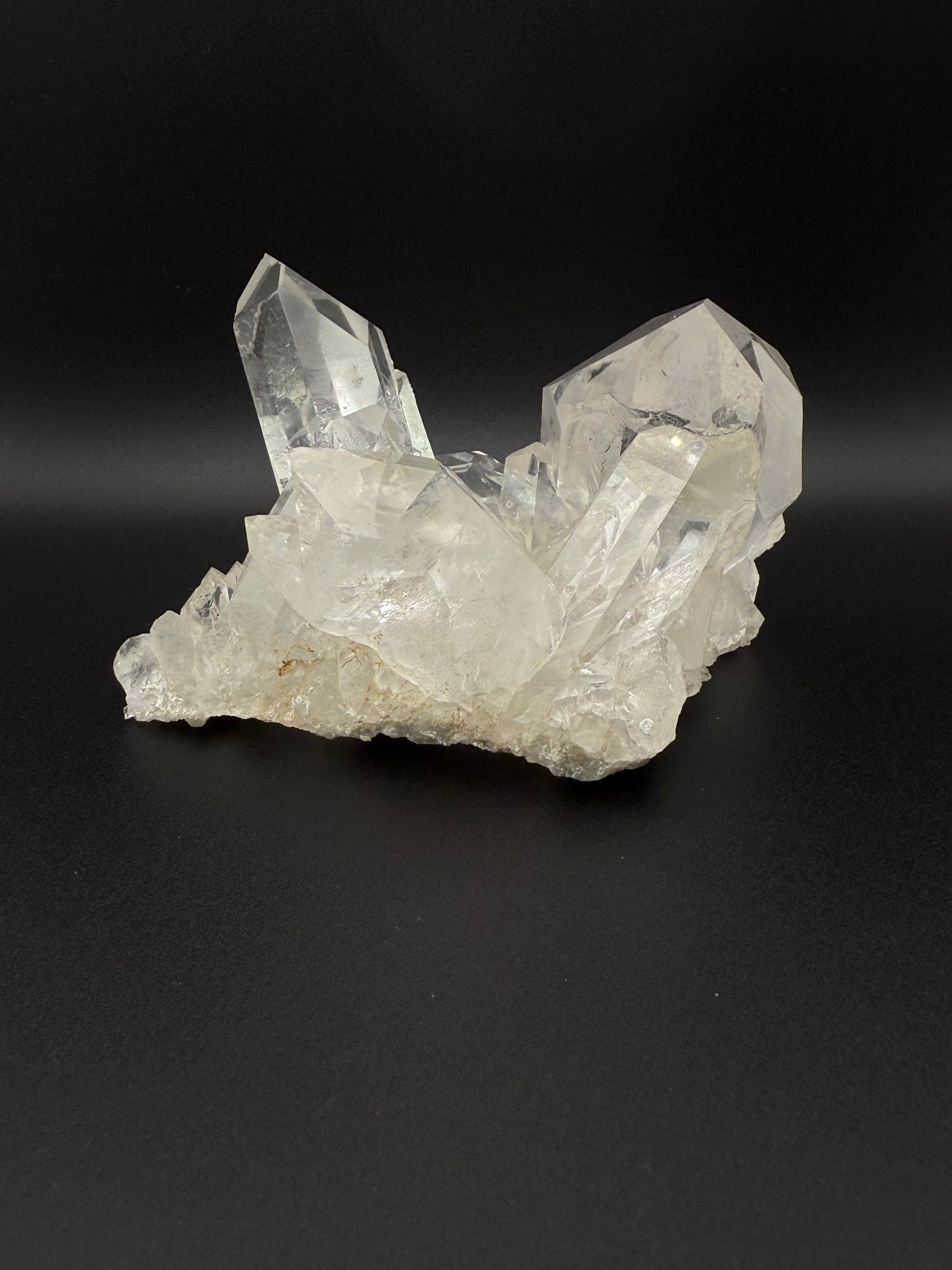 Large cluster of clear quartz crystals.