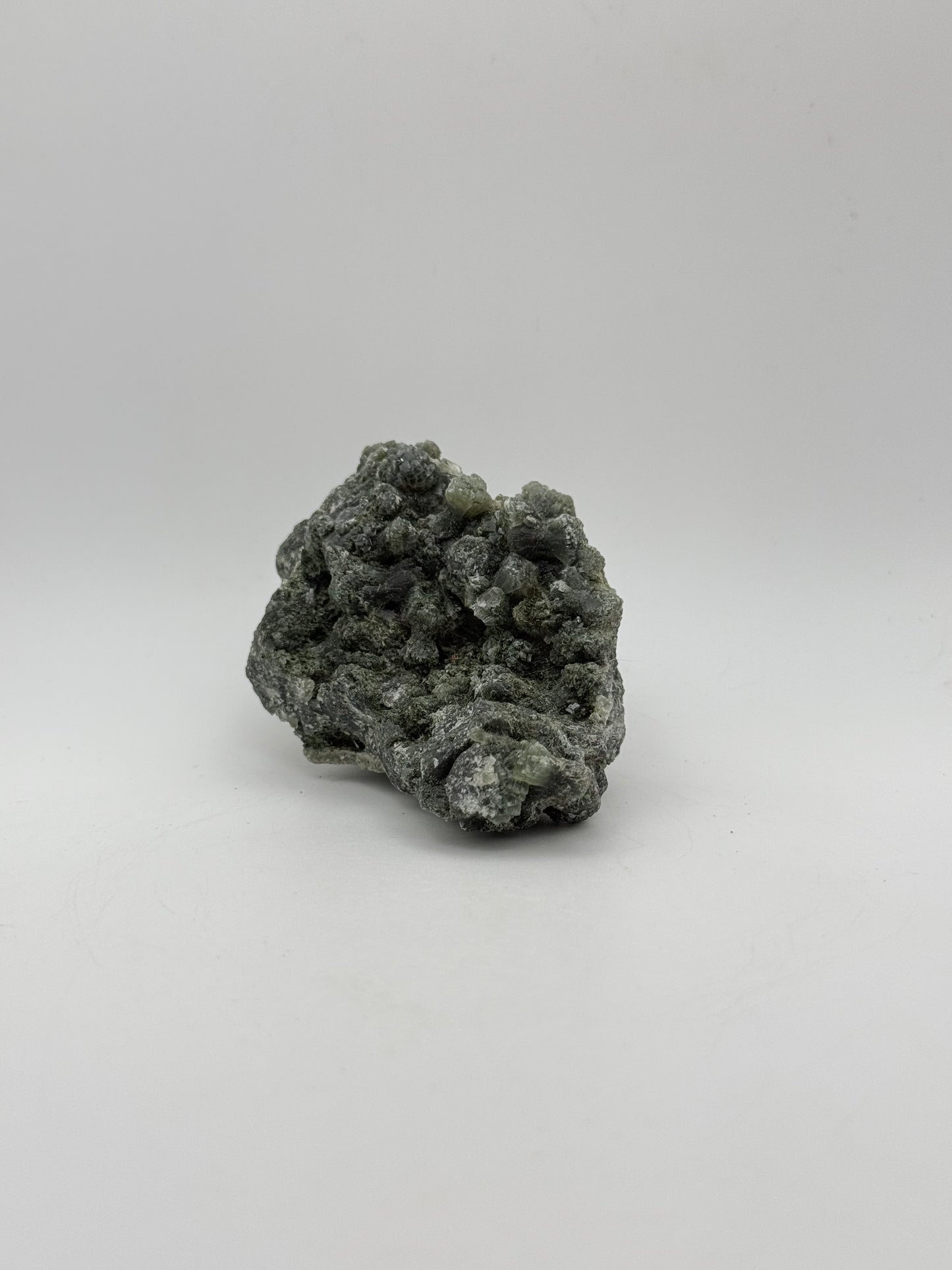 Raw prehnite specimen with amazing green color.