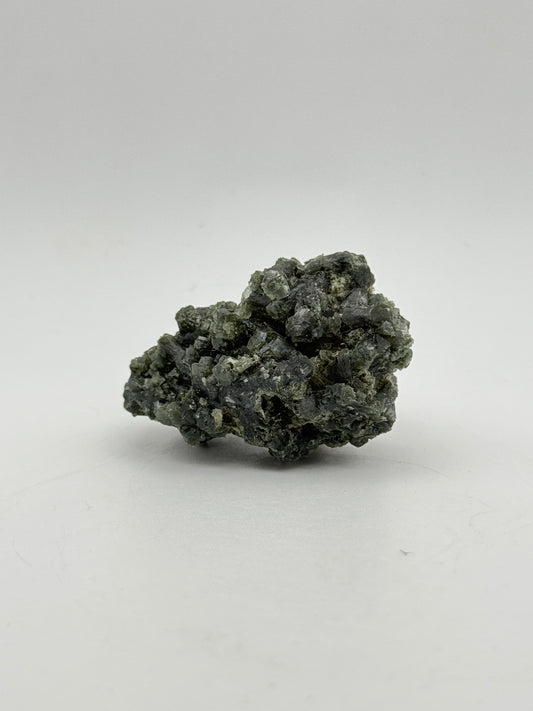 Raw prehnite specimen with amazing green color.